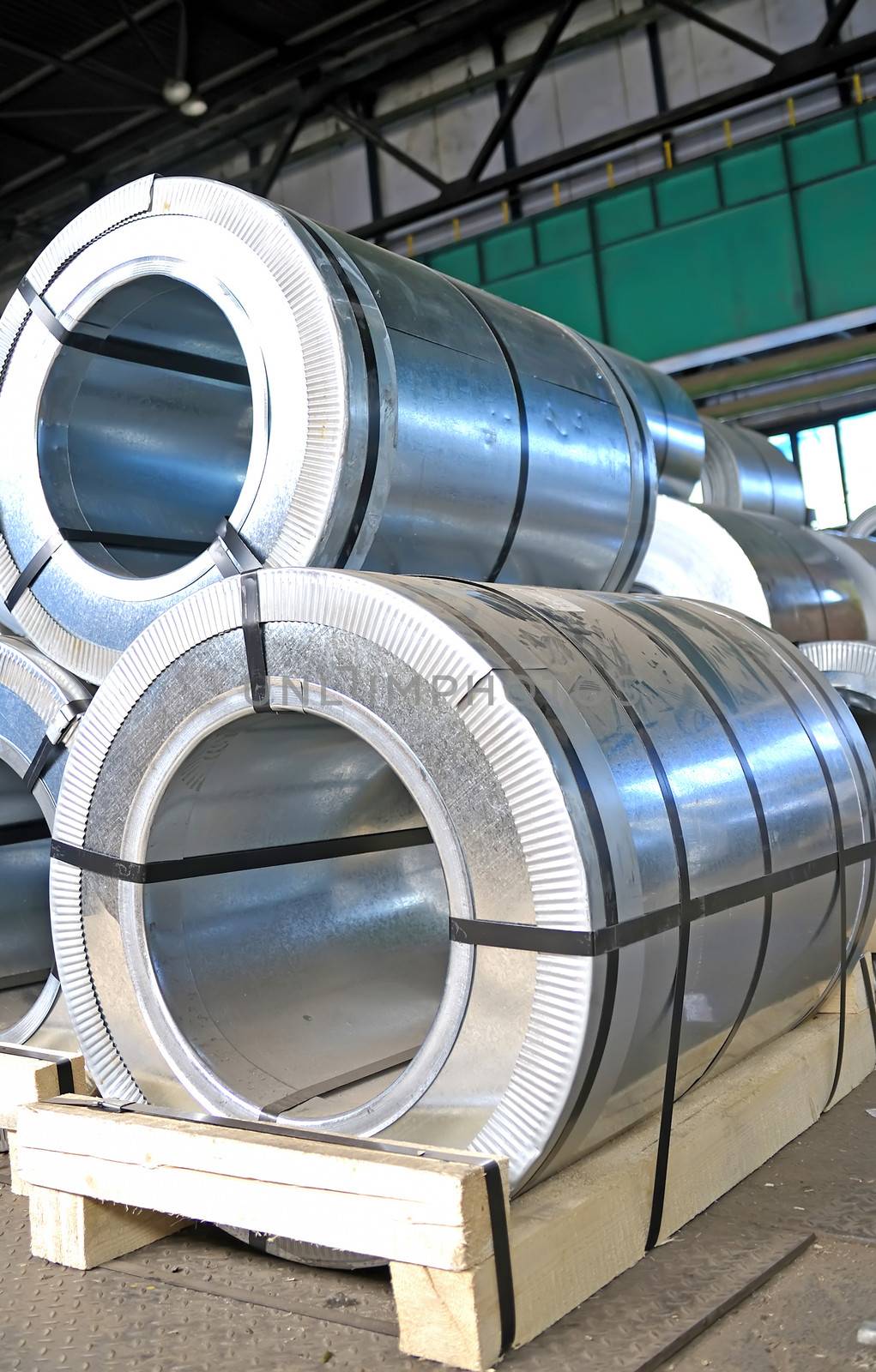 rolls of steel sheet in a warehouse by mady70