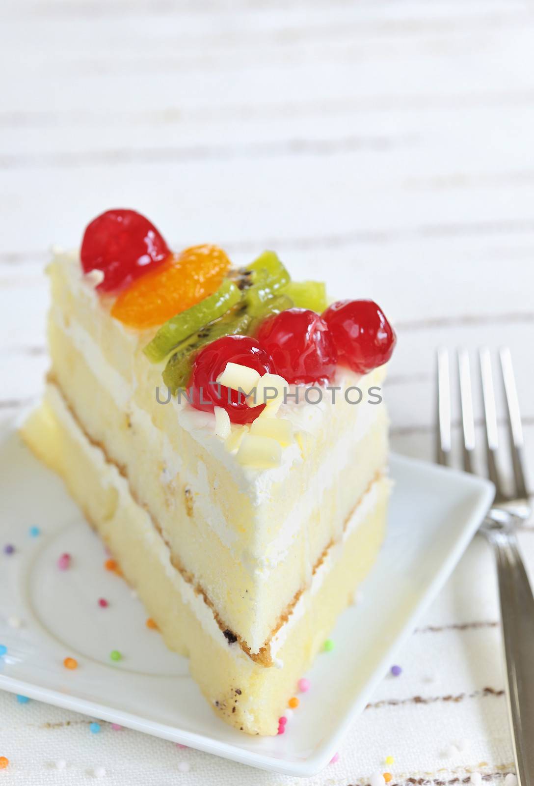piece of delicious cake on white background
