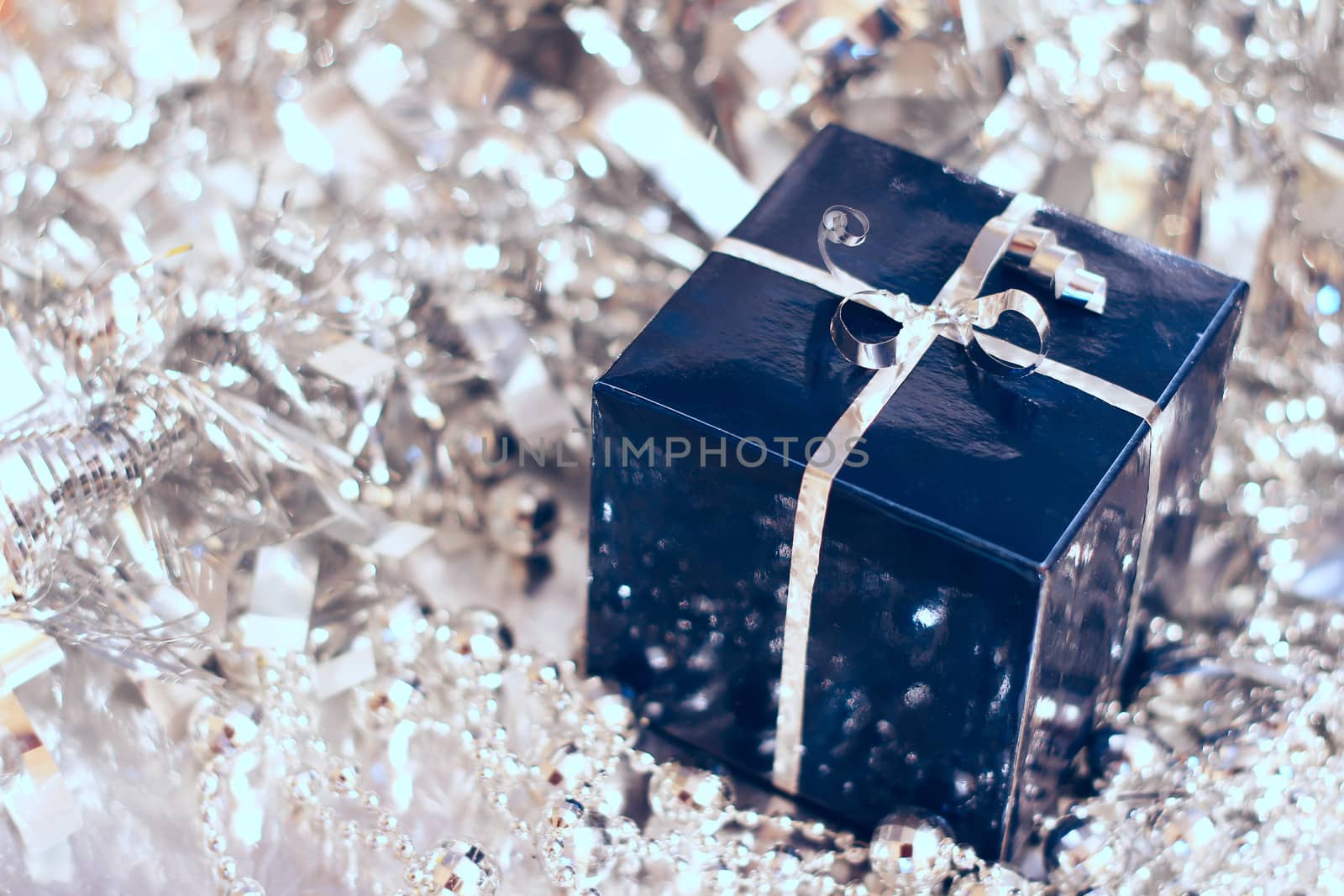 Blue christmas gift on silver decoration