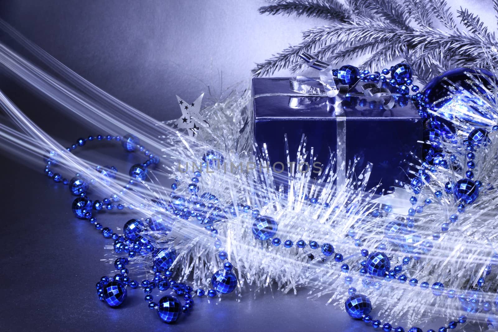 Magic christmas gift with silver and blue decoration