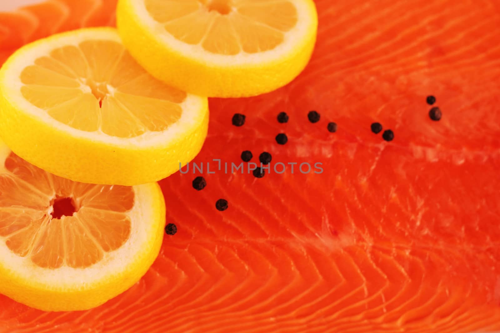 Salmon lemon and pepper background by destillat