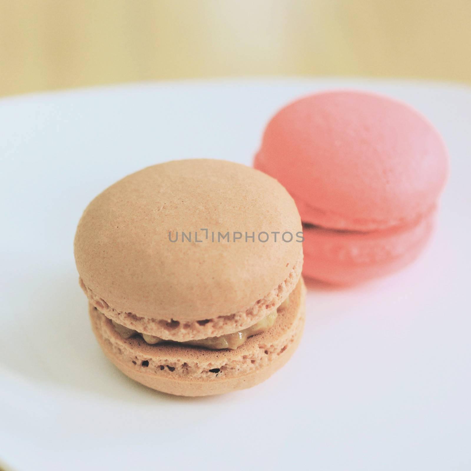 Tasty sweet macaron with retro filter effect
