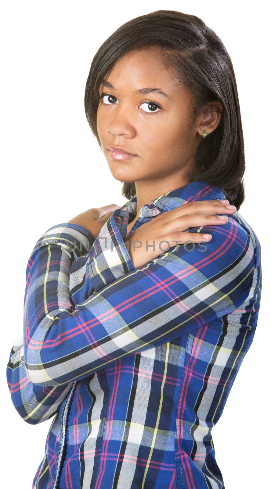 Serious teenage girl with hands on shoulders
