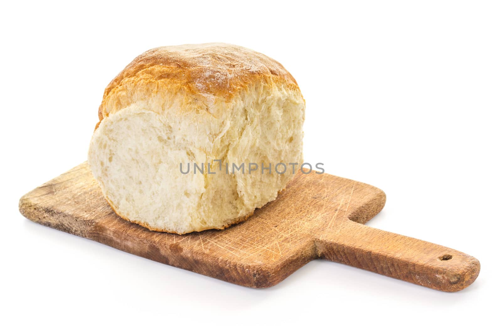 A quarter of four Buns Bread on old Cutting Board, high key