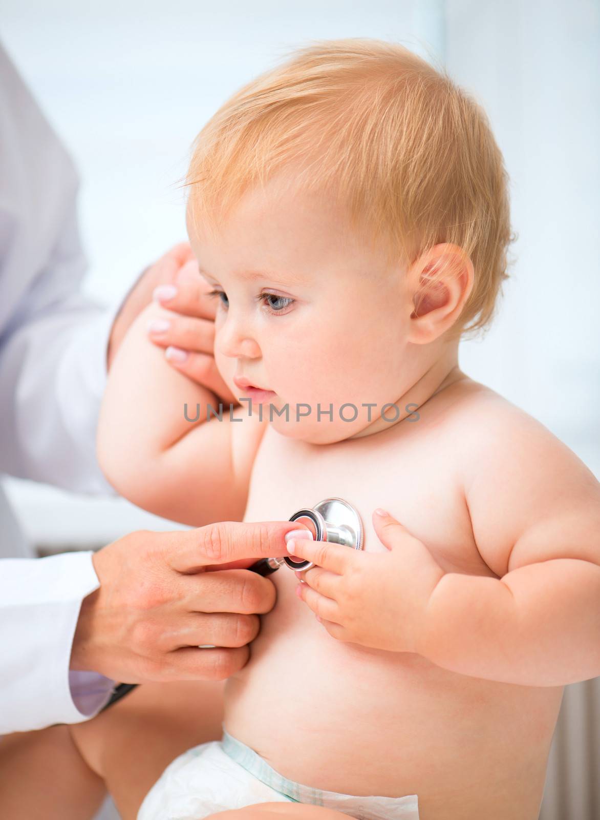 baby at the doctor pediatrician.