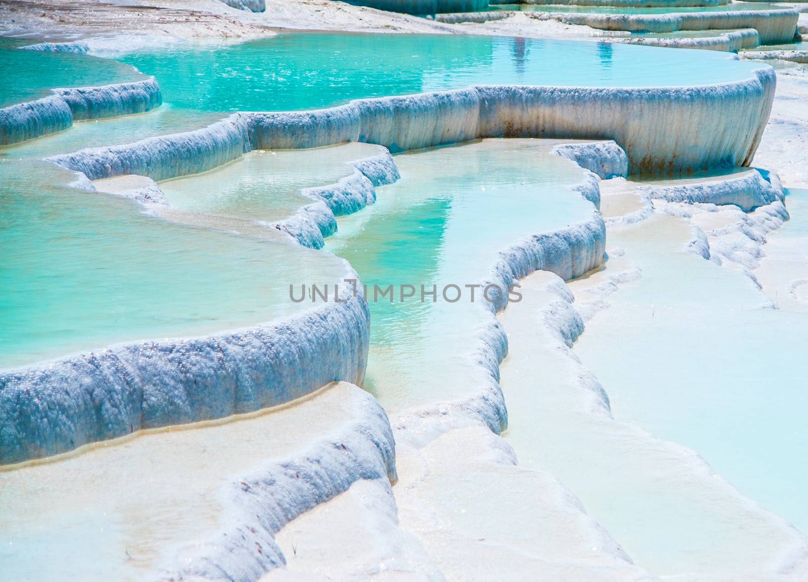 Famous blue travertine pools and terraces in Pamukkale Turkey