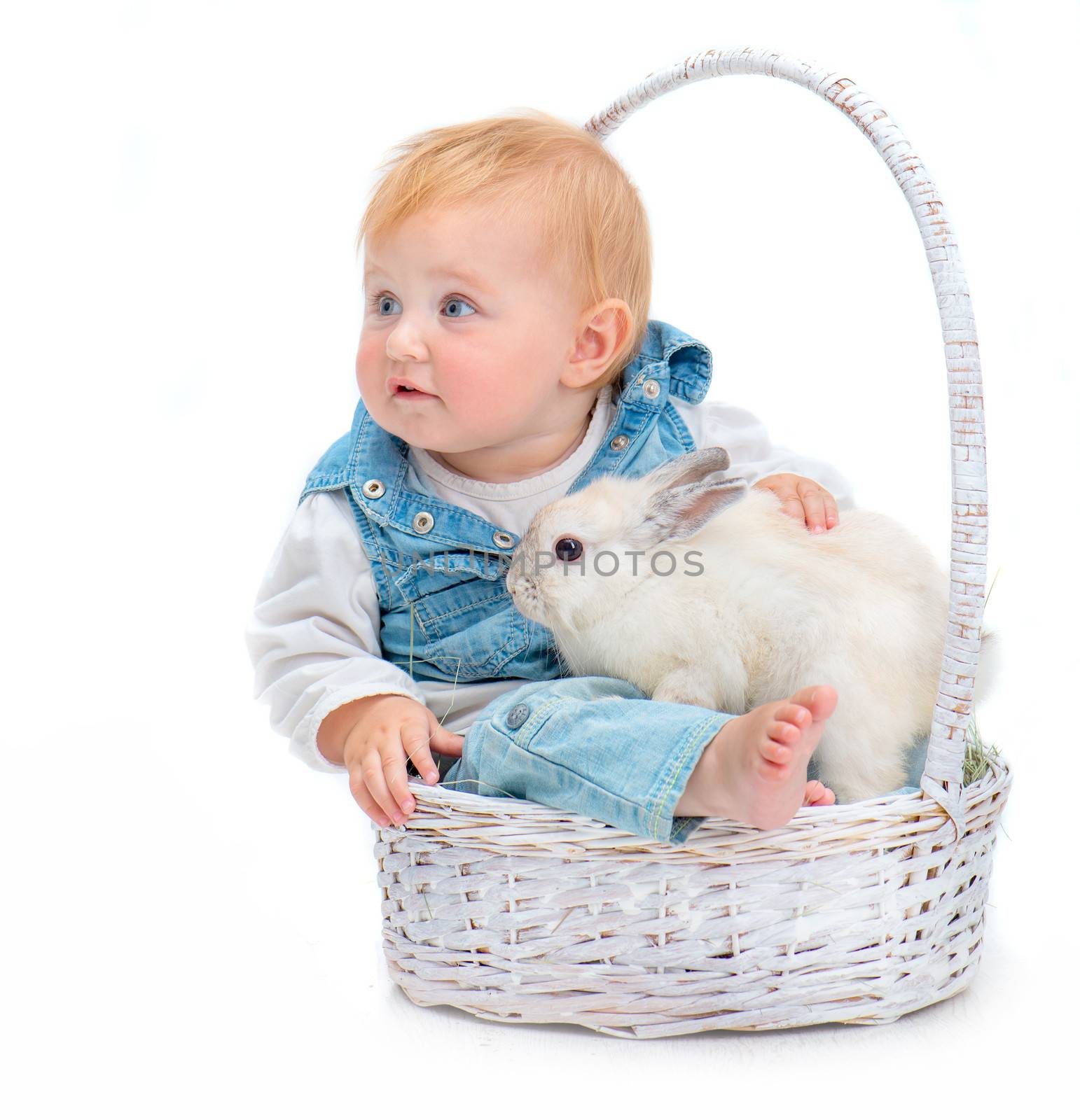 cute baby with white rabbit isolated on light background