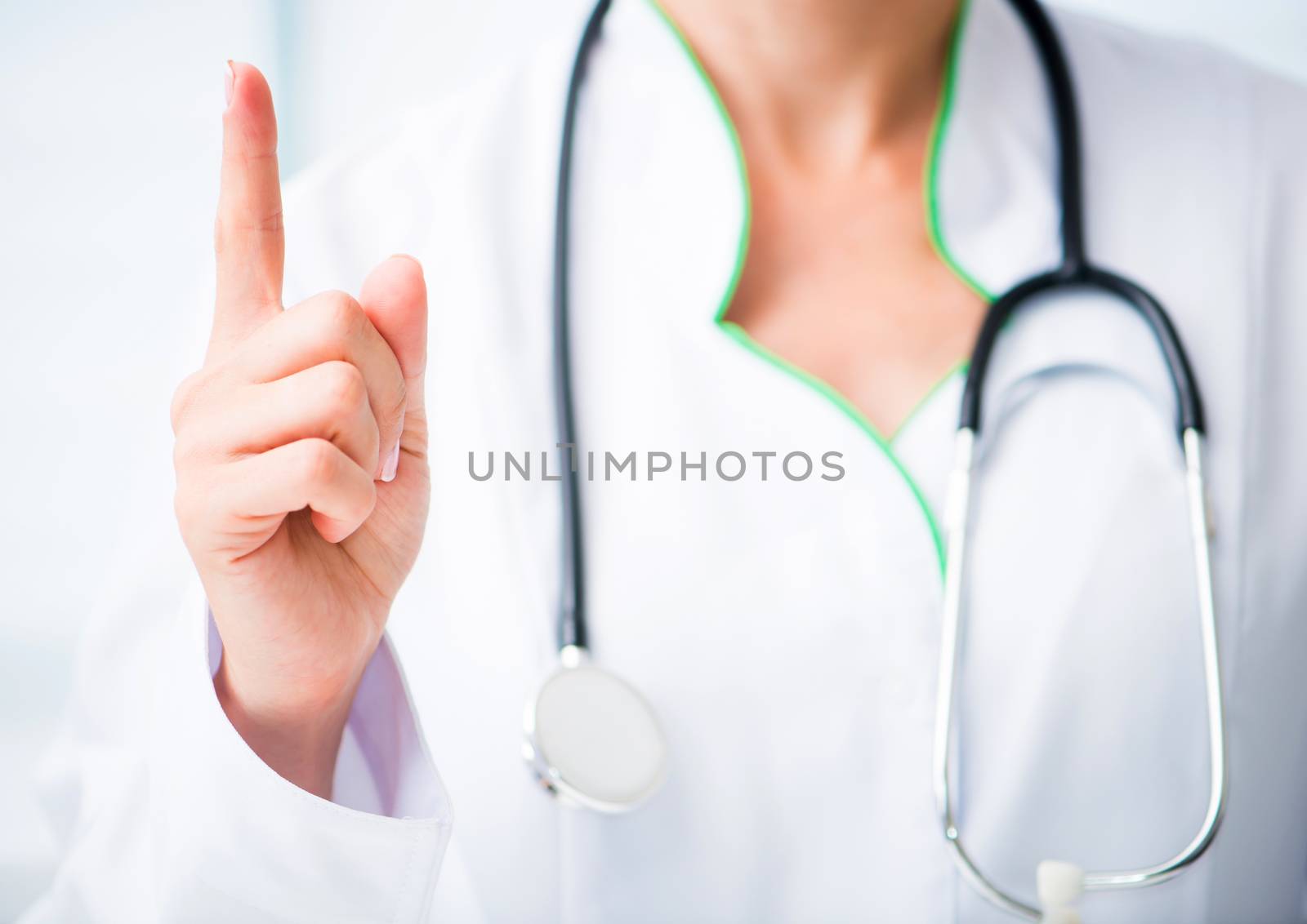 Doctor with his index finger upwards