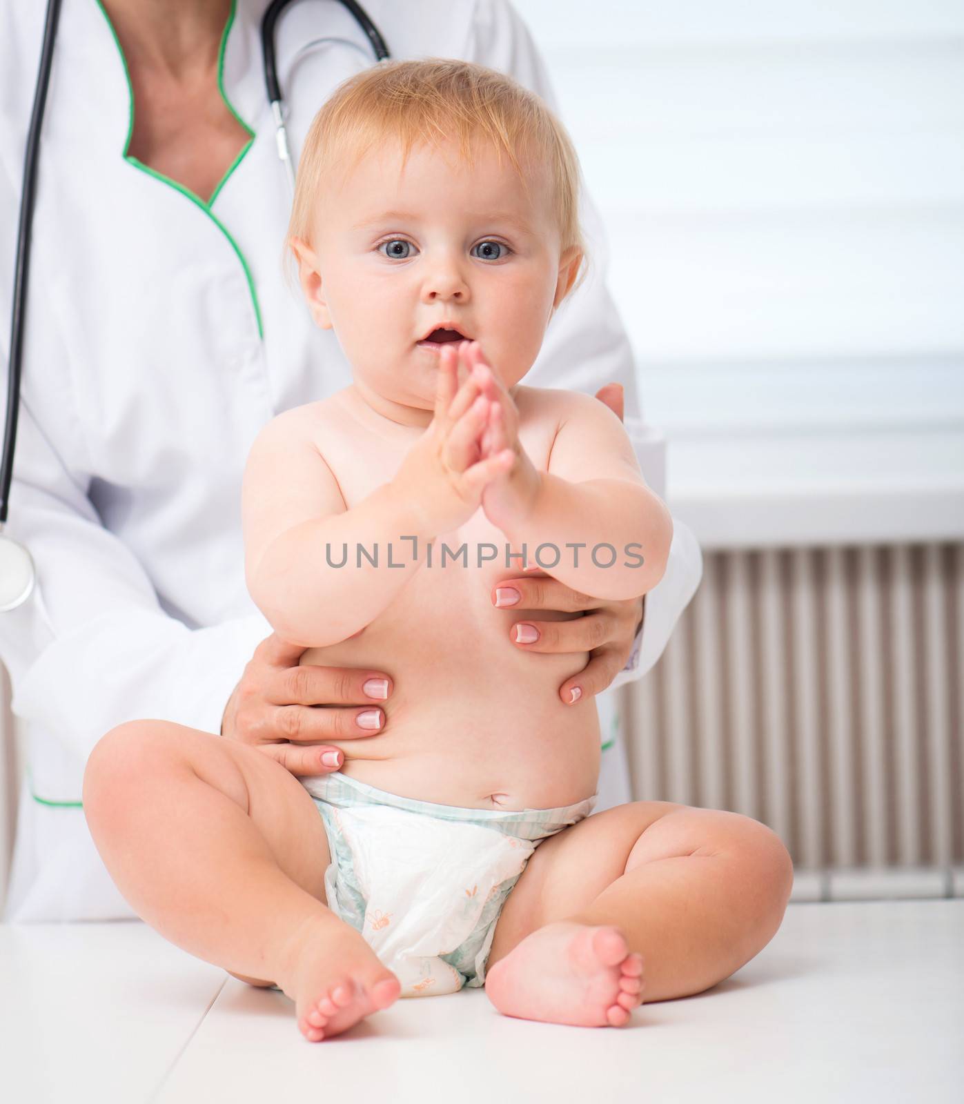 baby at the doctor pediatrician on office