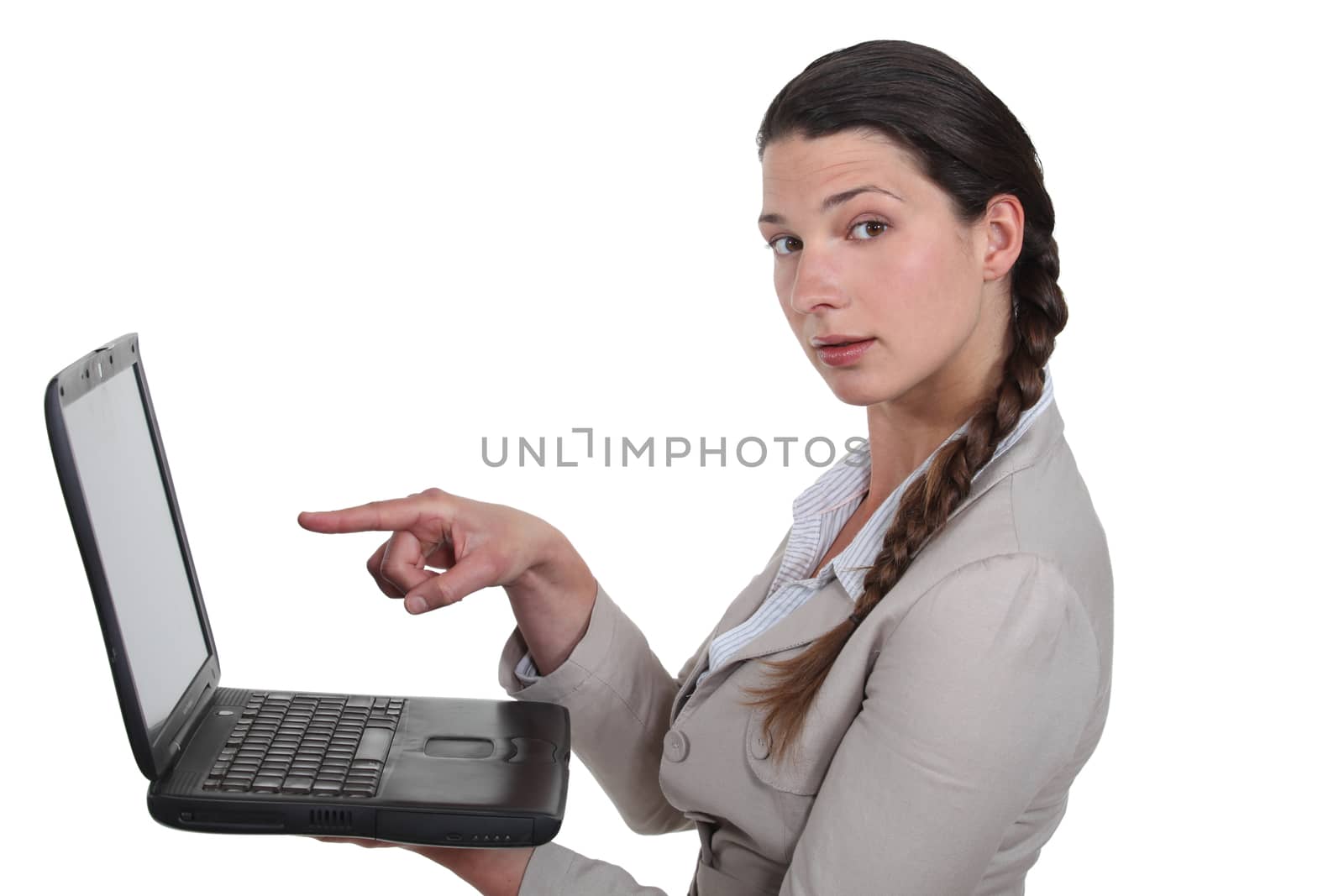 Businesswoman with a blank laptop
