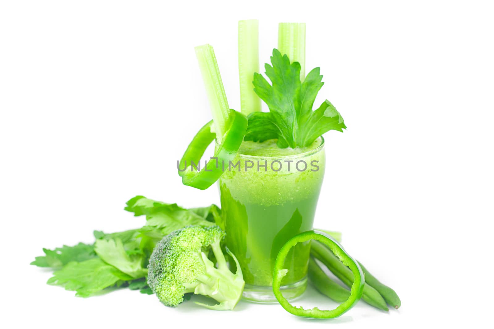 broccoli,pepper,celery and glass with celery juice isolated on white