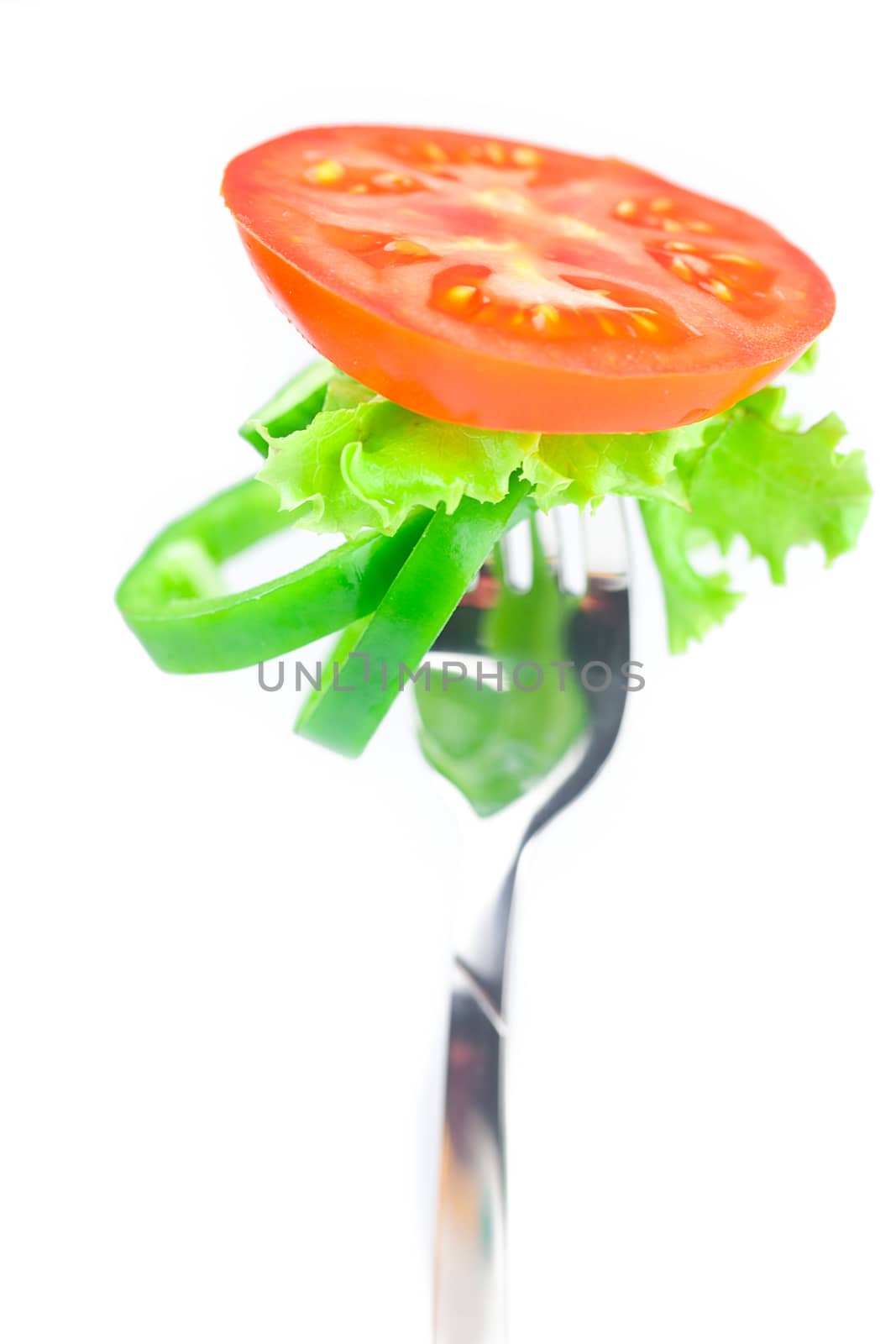 tomato ,lettuce,fork ,cucumber and pepper isolated on white by jannyjus