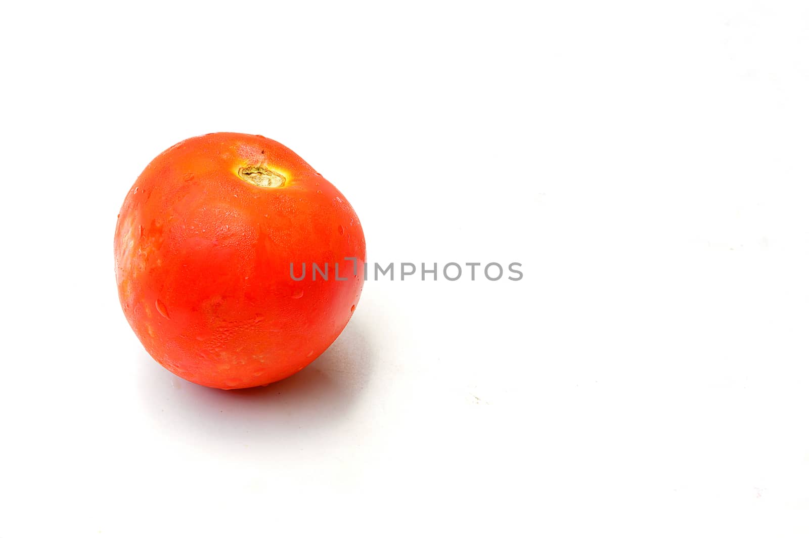 Ripe red tomatoes isolated on white background