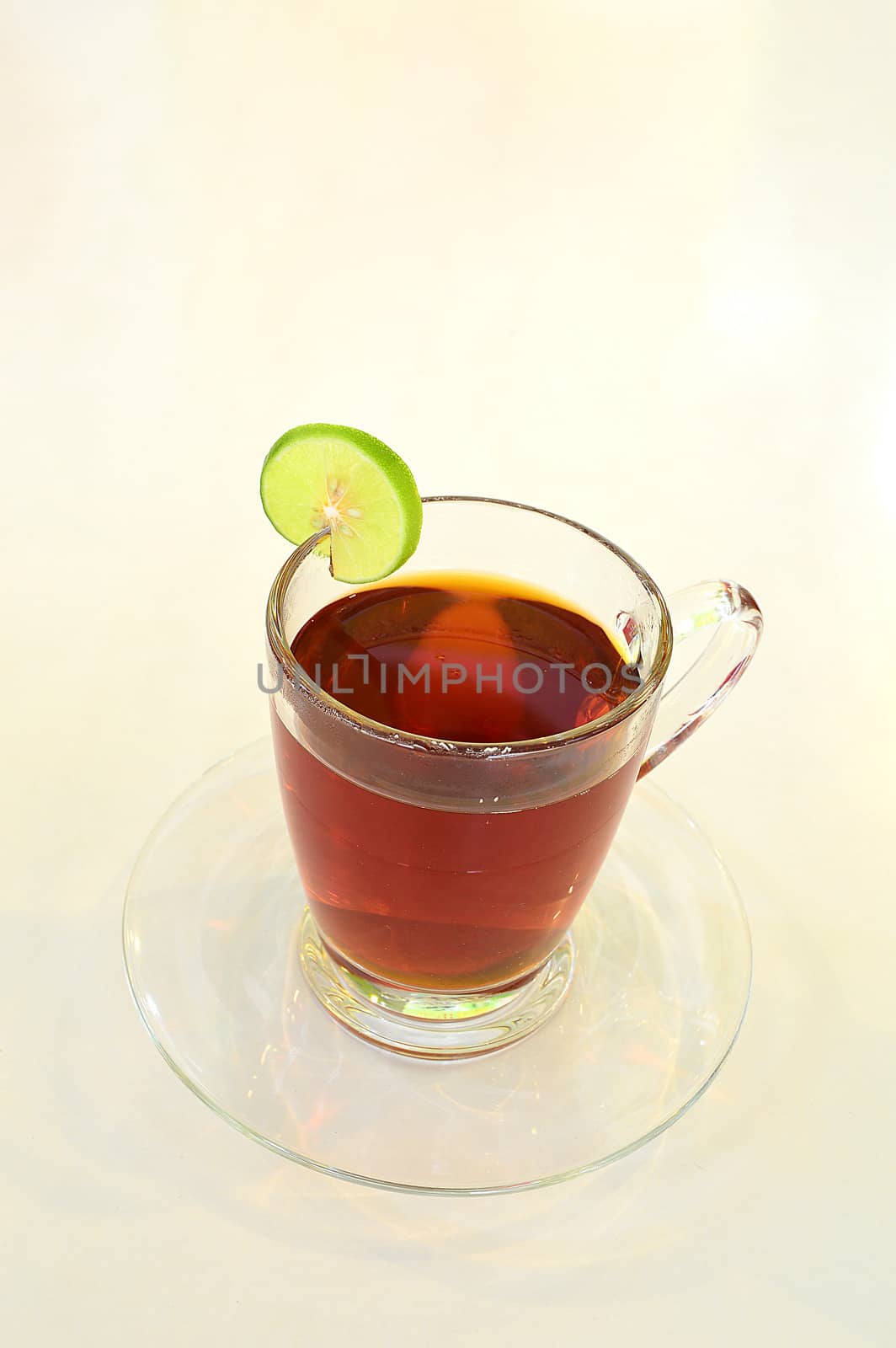 Cup of tea with lemon isolate on white background