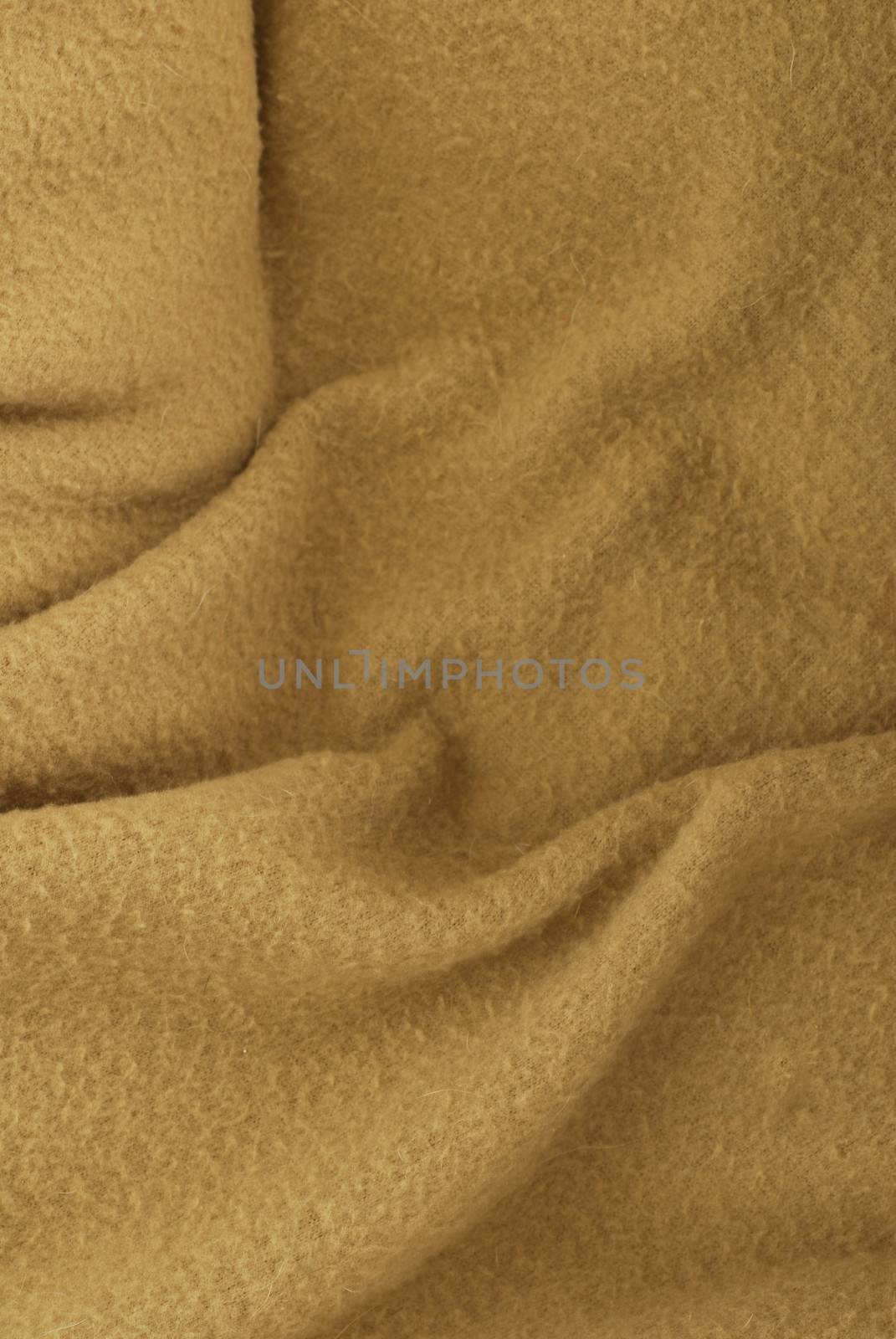 worn fabric background - beige polar fleece