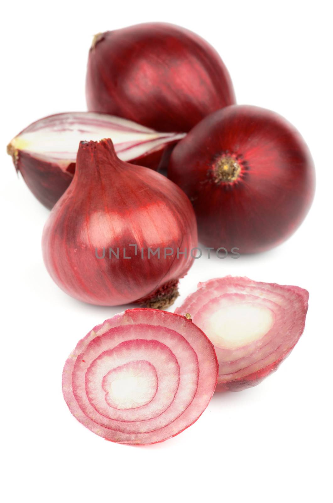 Heap of Raw Red Onion Full Body and Slices isolated on white background