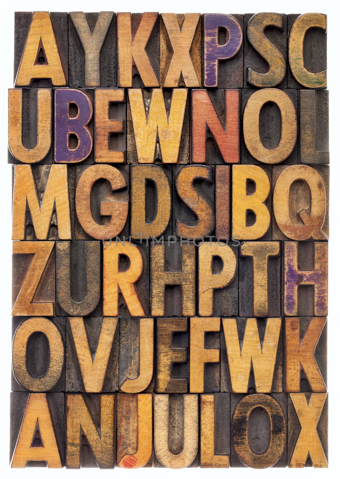 random letters of alphabet - vintage letterpress wood type printing blocks scratched and stained by color inks