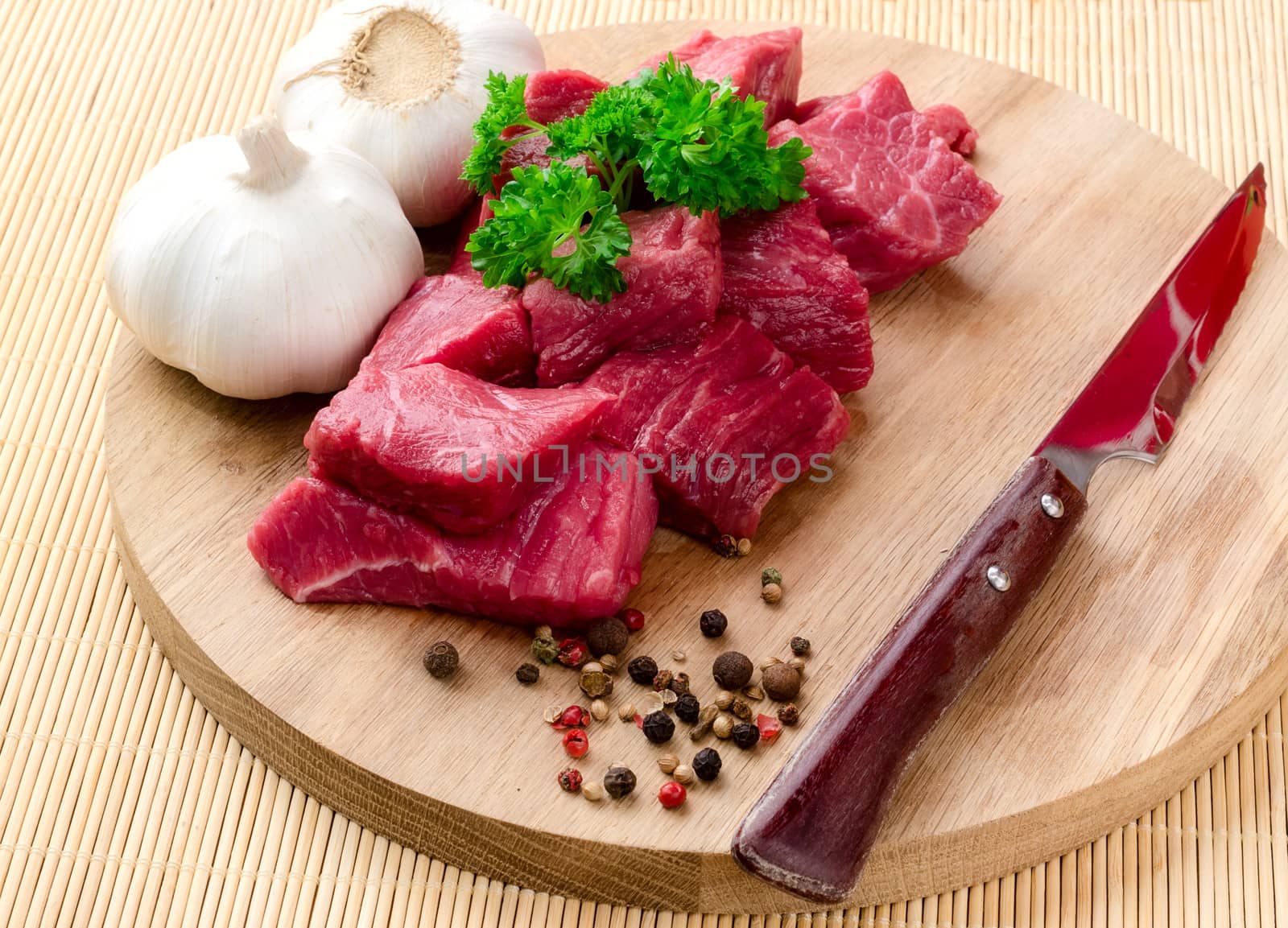 raw meat, vegetables and spices