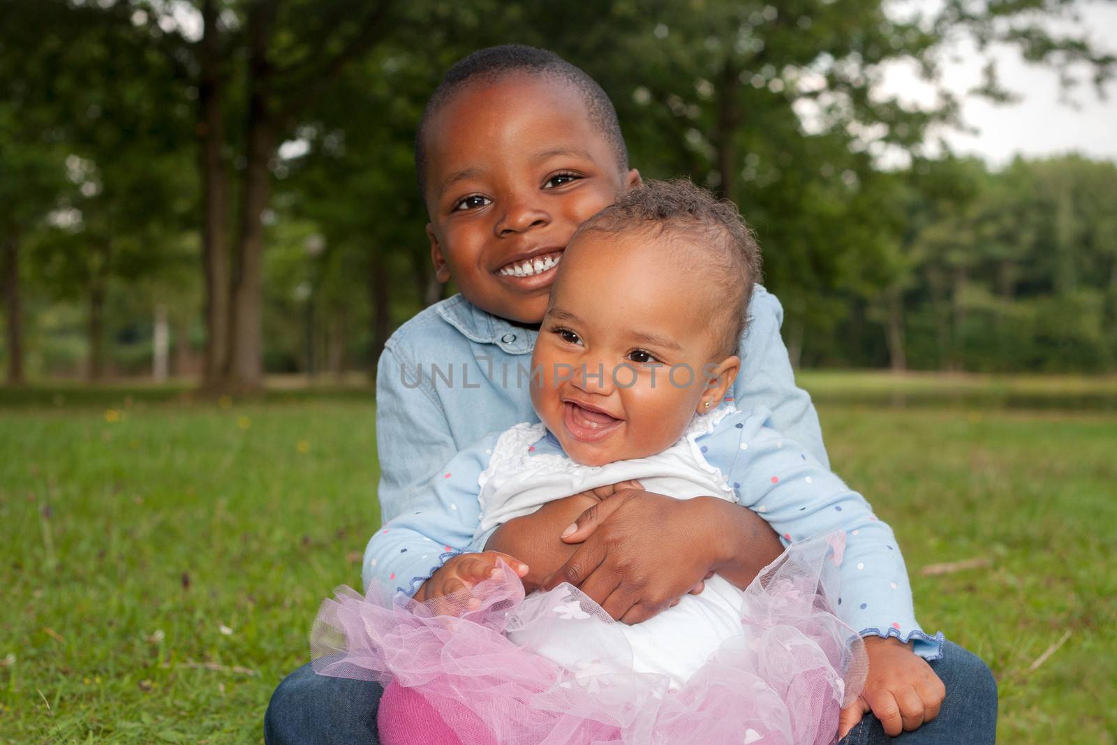 Happy little children are having a nice day in the park