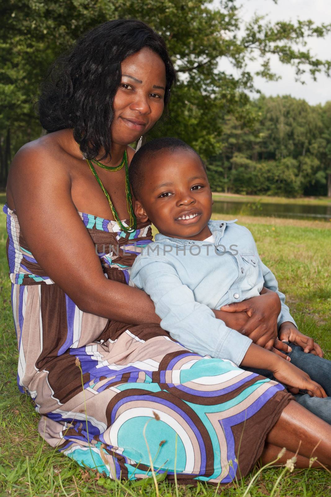 Happy mixed family is having a nice day in the park