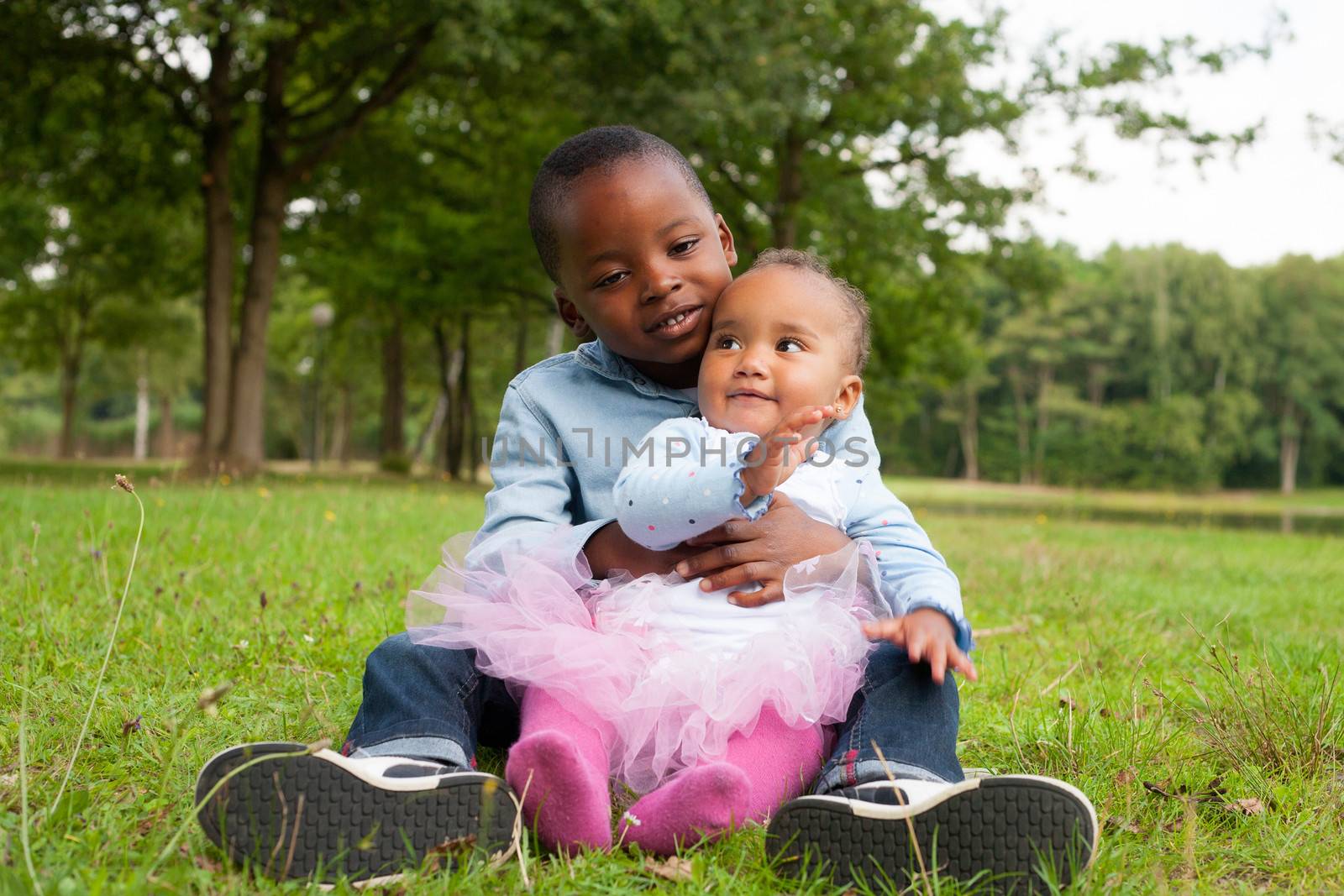 Happy little children are having a nice day in the park