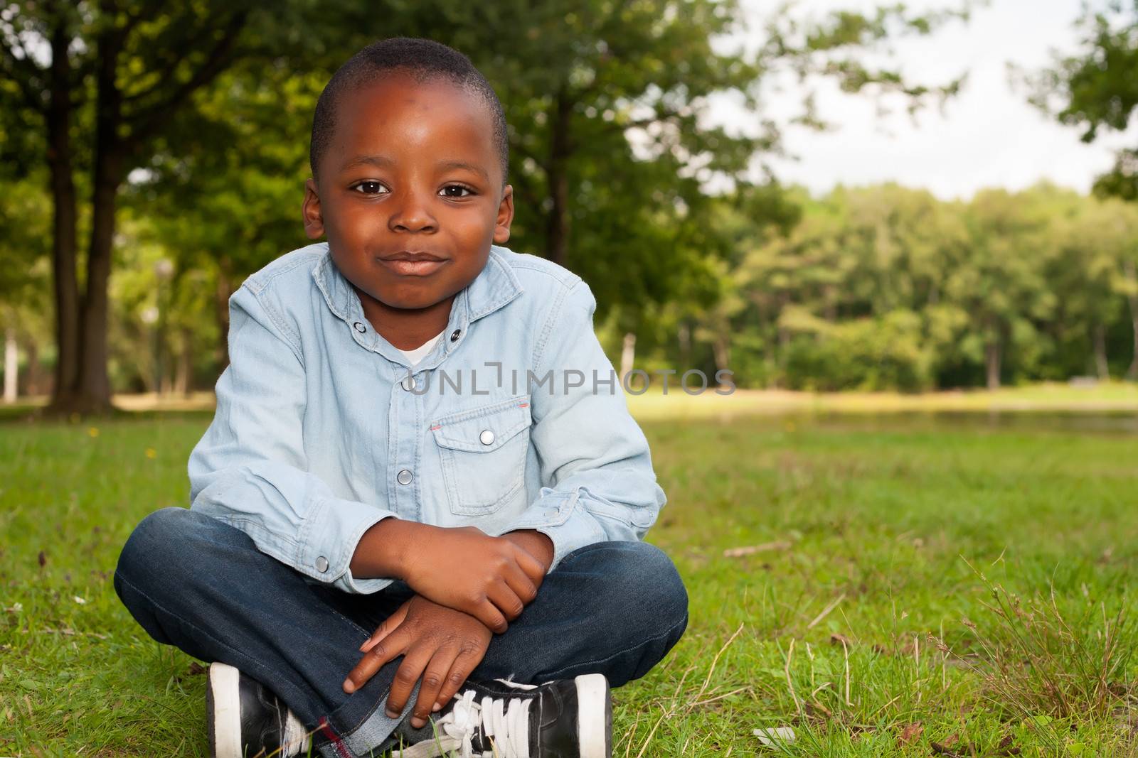 Happy little child is having a nice day in the park