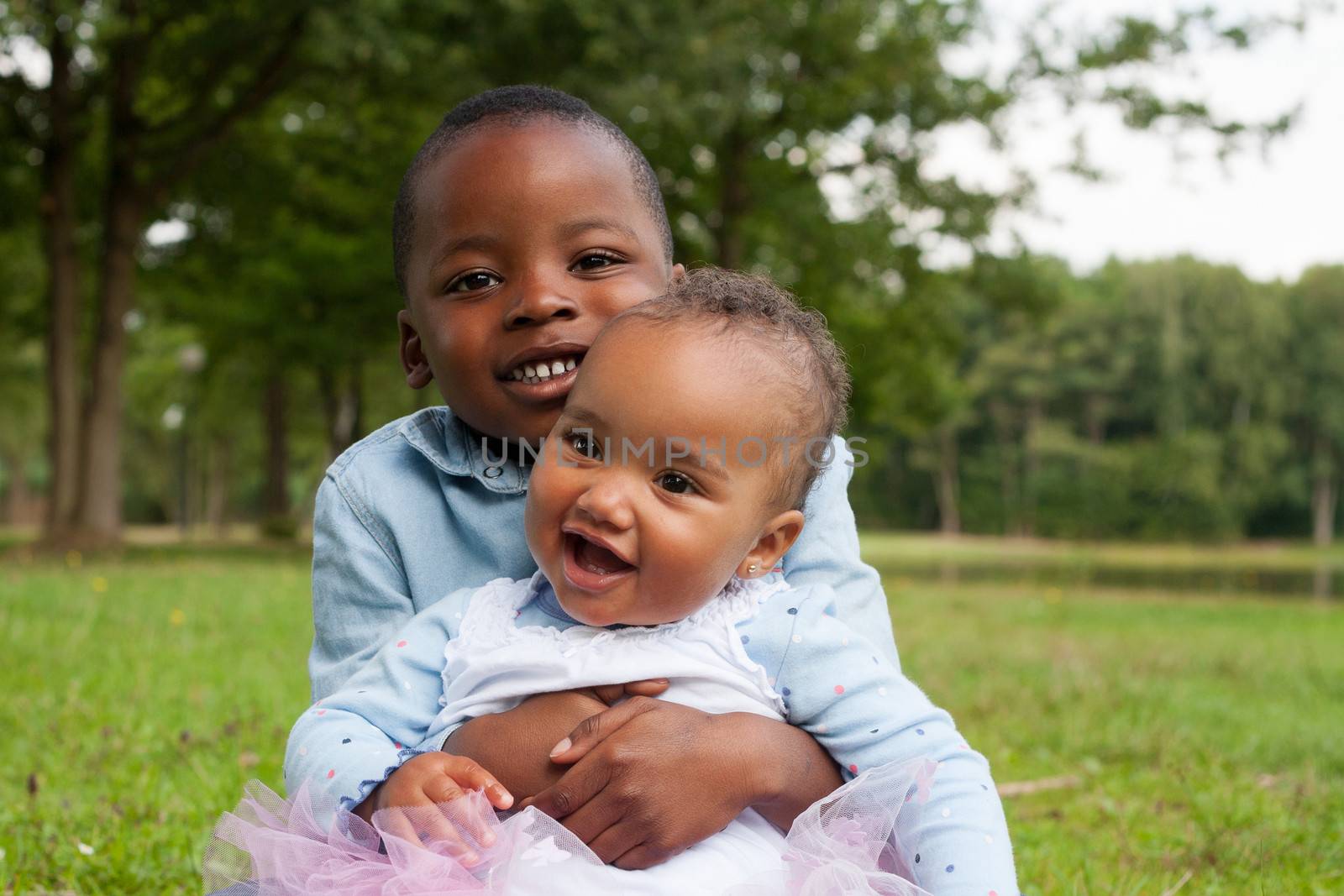 Happy little children are having a nice day in the park