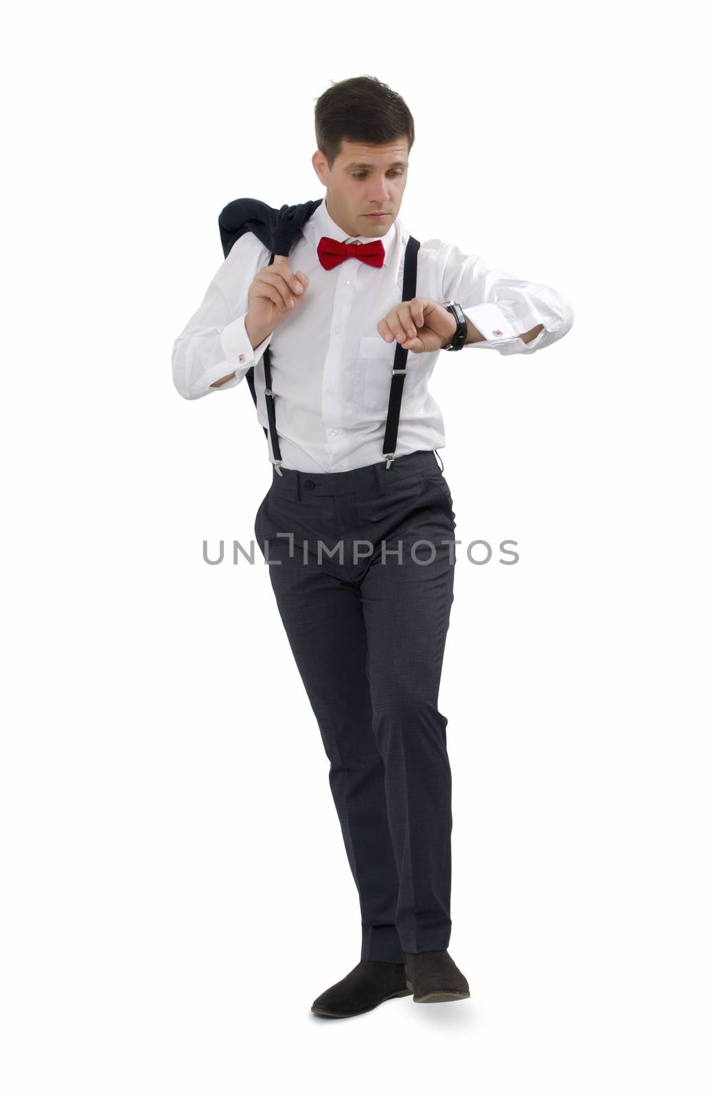 Businessman against a white background walking and looking at clock