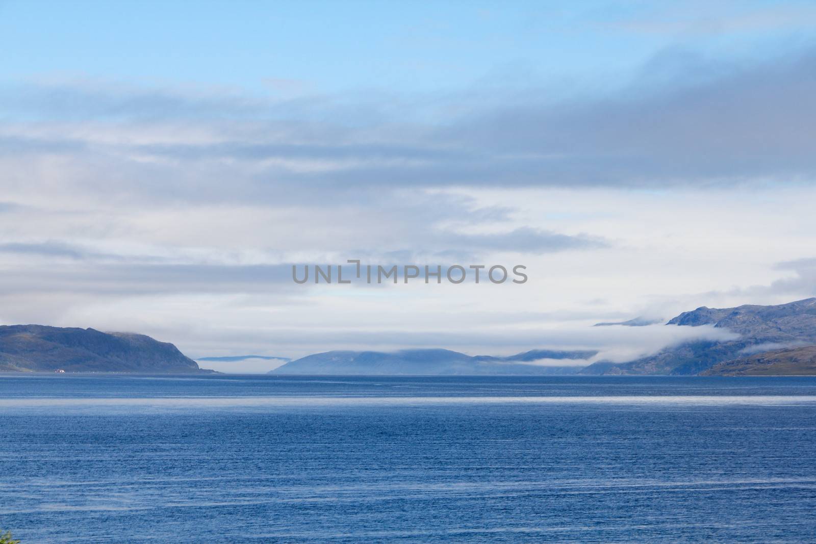 View of bay, blouds and mountains in northern Norway