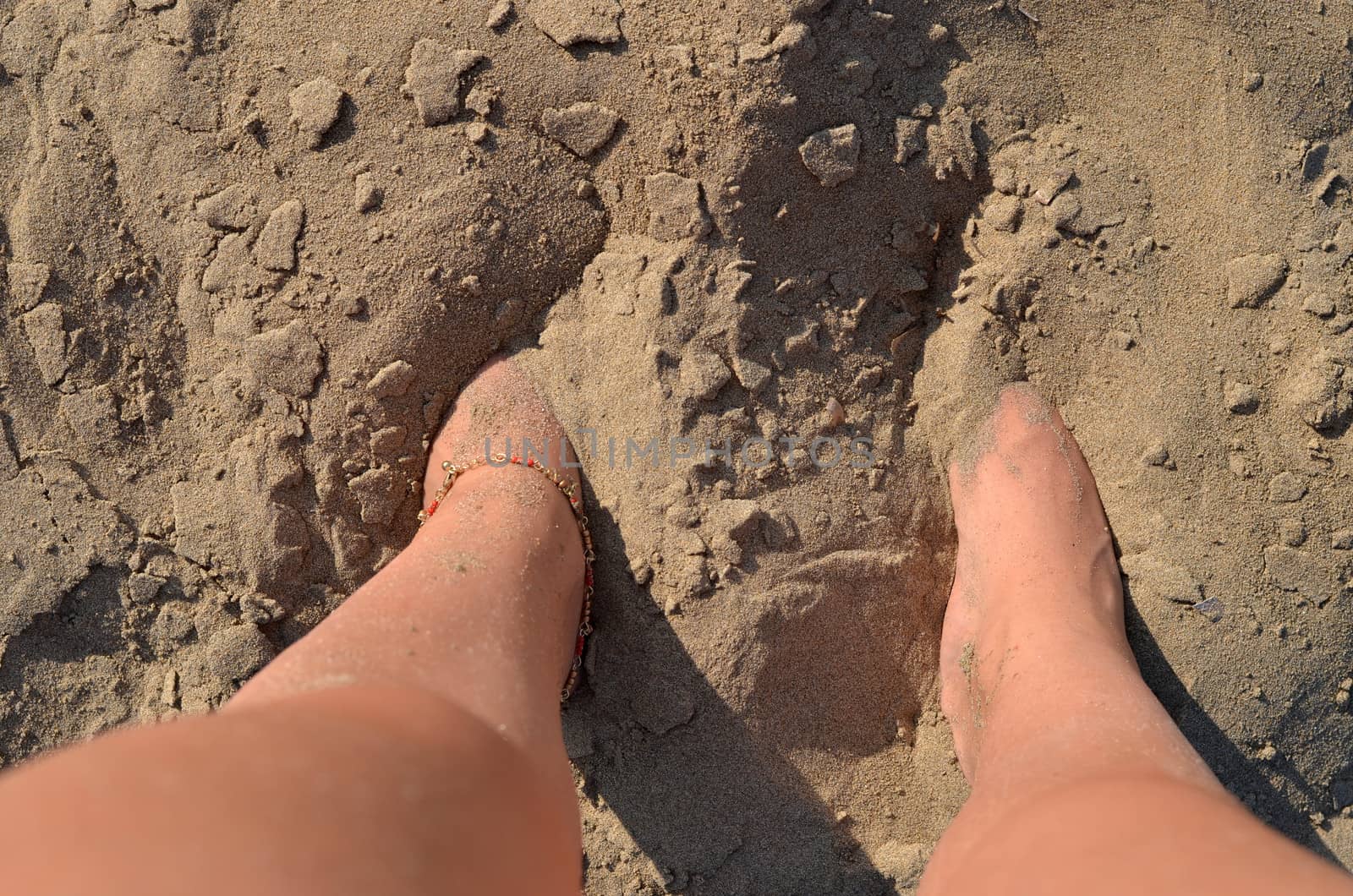 feet  in the sea sand