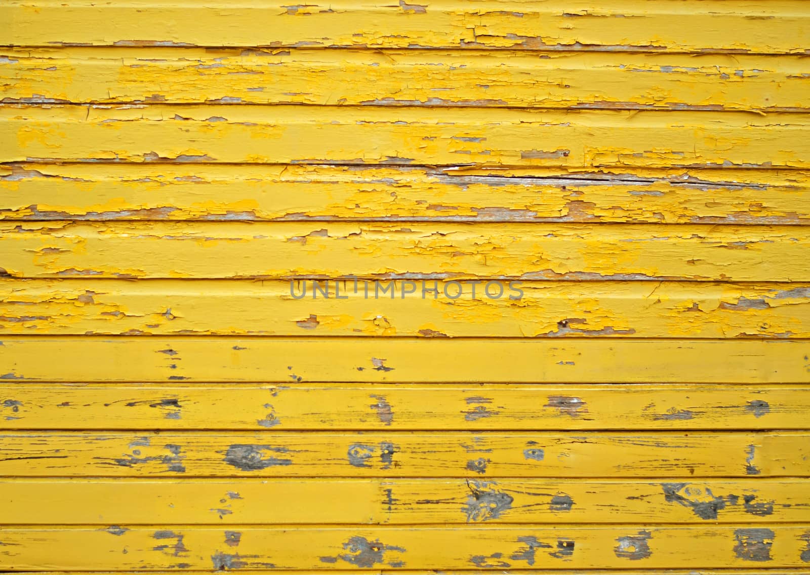 Old yellow wooden wall