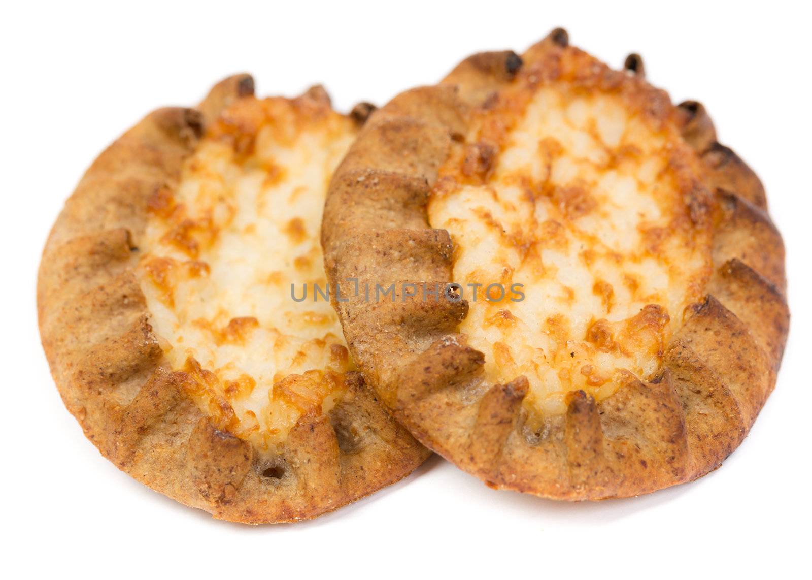 Traditional Finnish Karelian pasties on white background