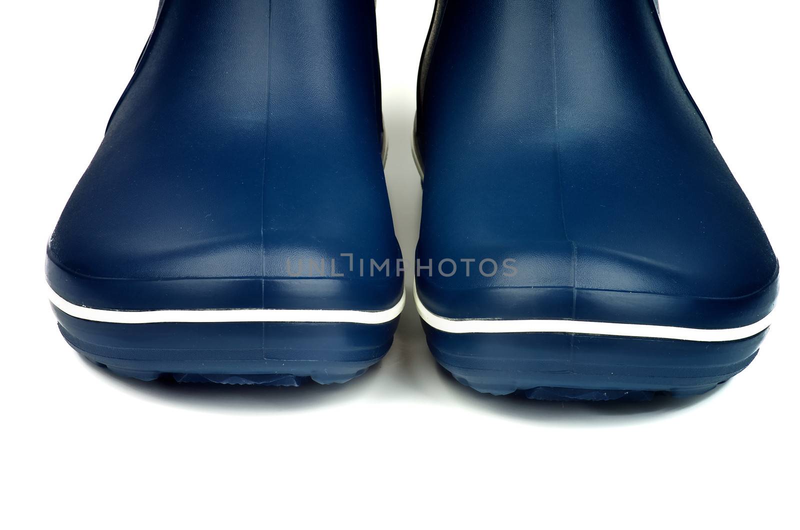 Noses of Contemporary Dark Blue Rubber Boots closeup on white background