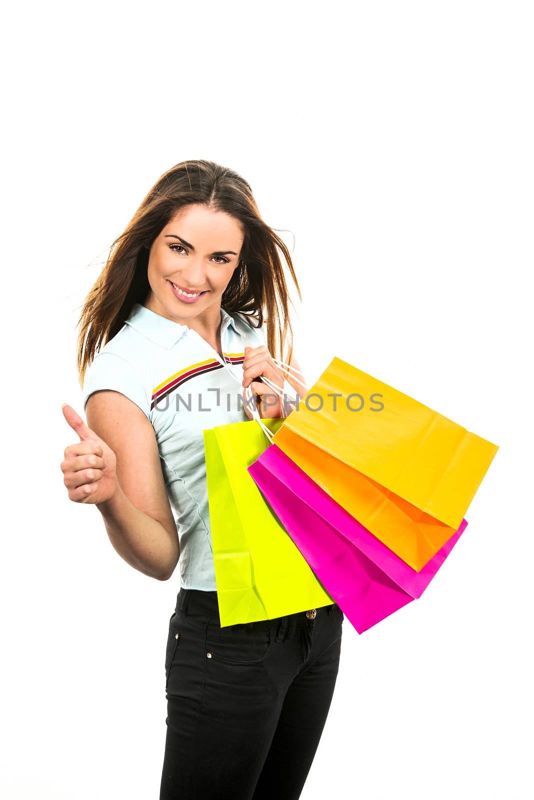 portrait young adult girl with colored bags