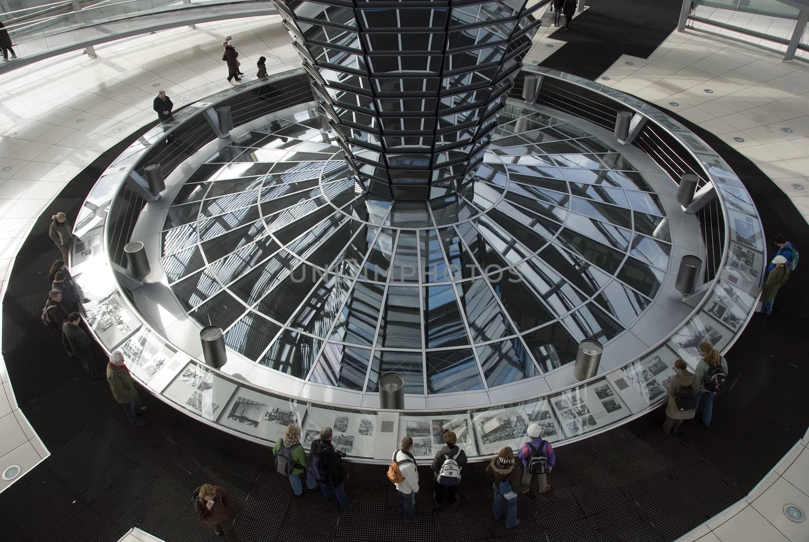 People in the Cupola on top of the Reichstag building in Berlin