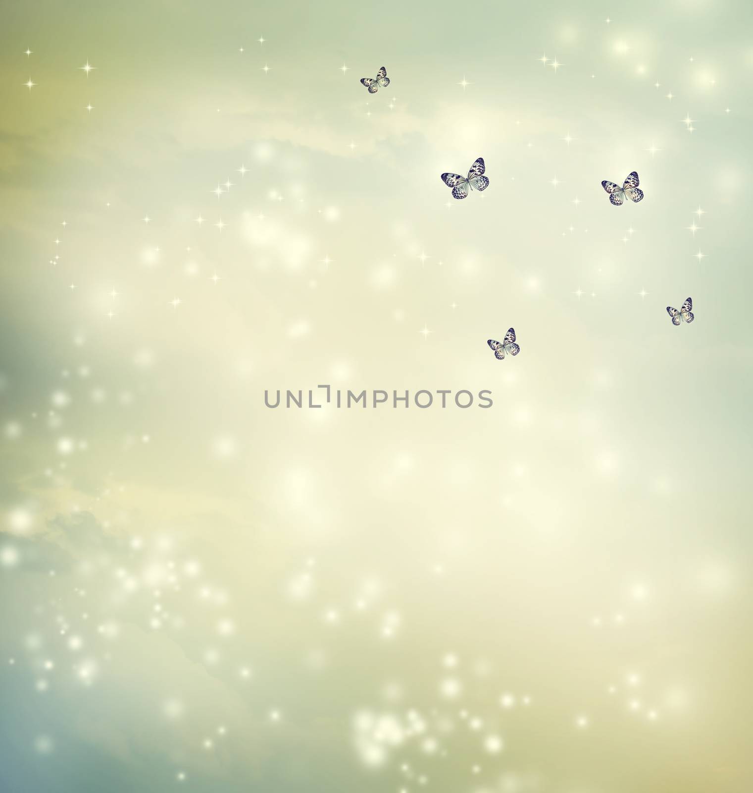 Small butterflies in a fantasy sky