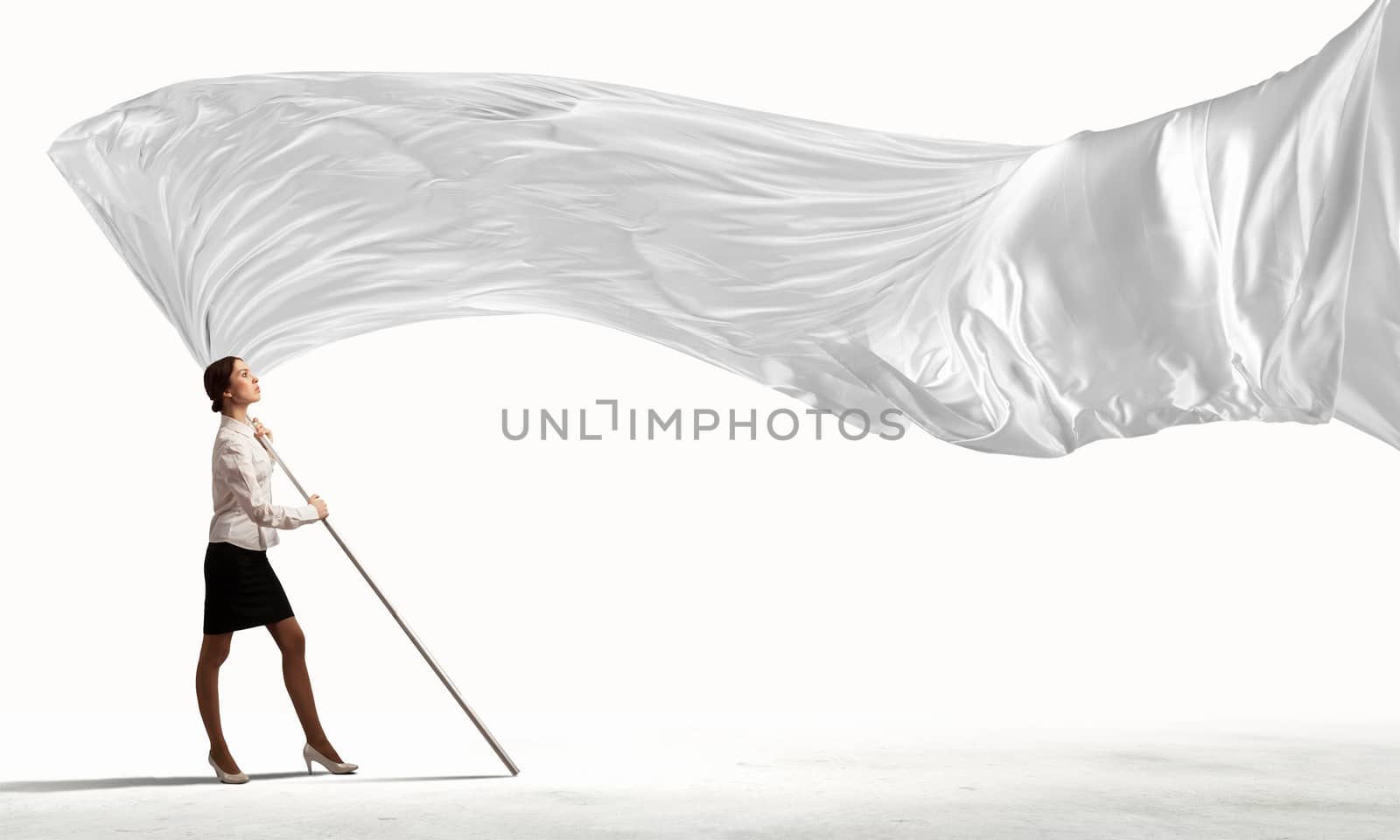 Image of attractive businesswoman holding white flag. Place for text