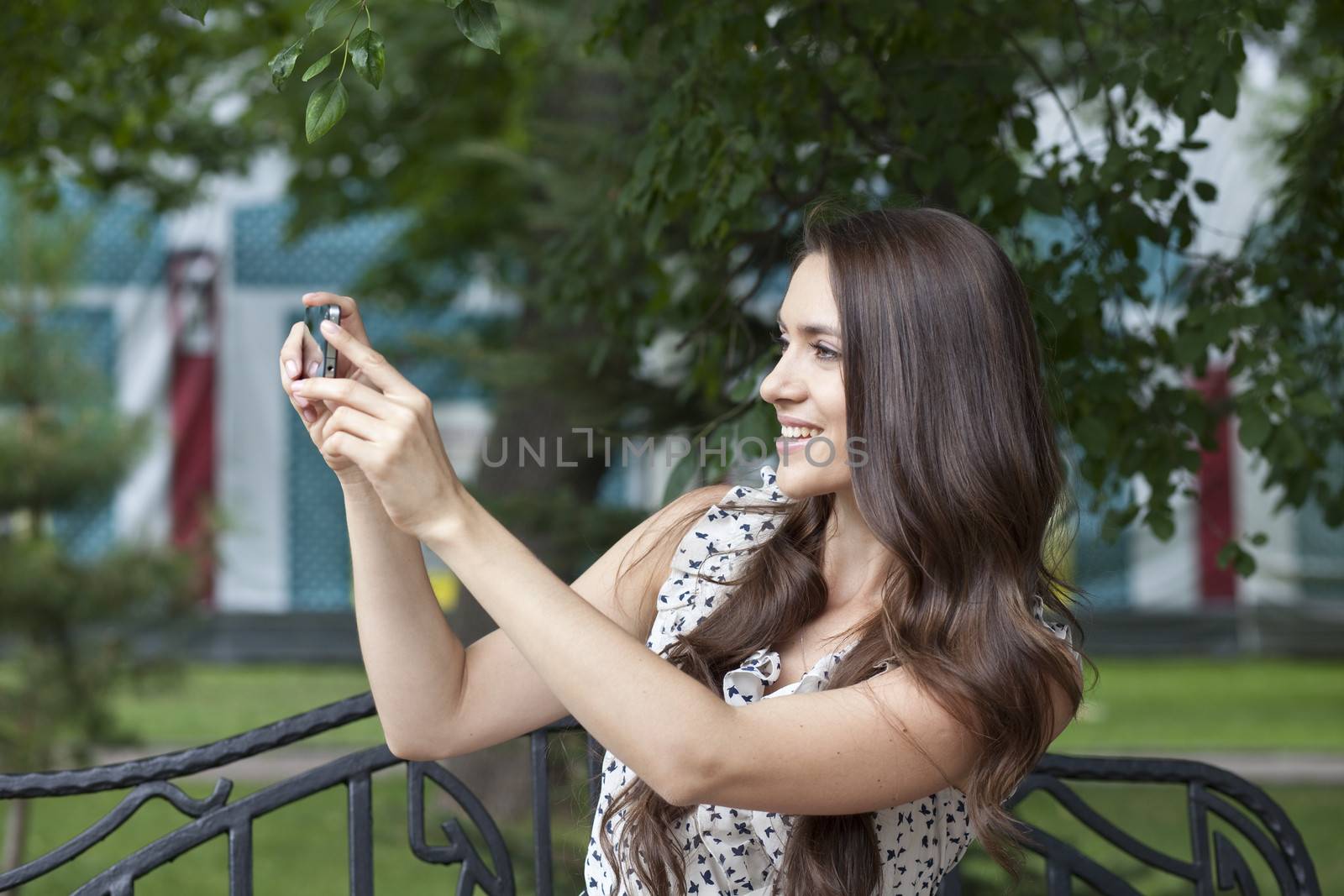 Young woman reading a message on the phone