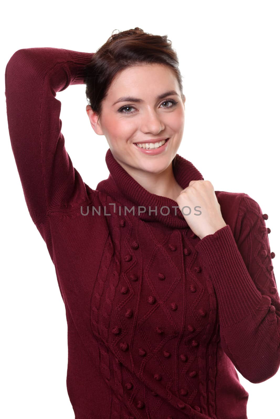 portrait of a beautiful happy woman in a knitted jacket by andersonrise