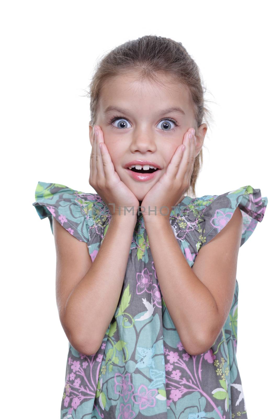 close-up portrait of a little amazing girl with blue eyes and opening mouth isolated on white