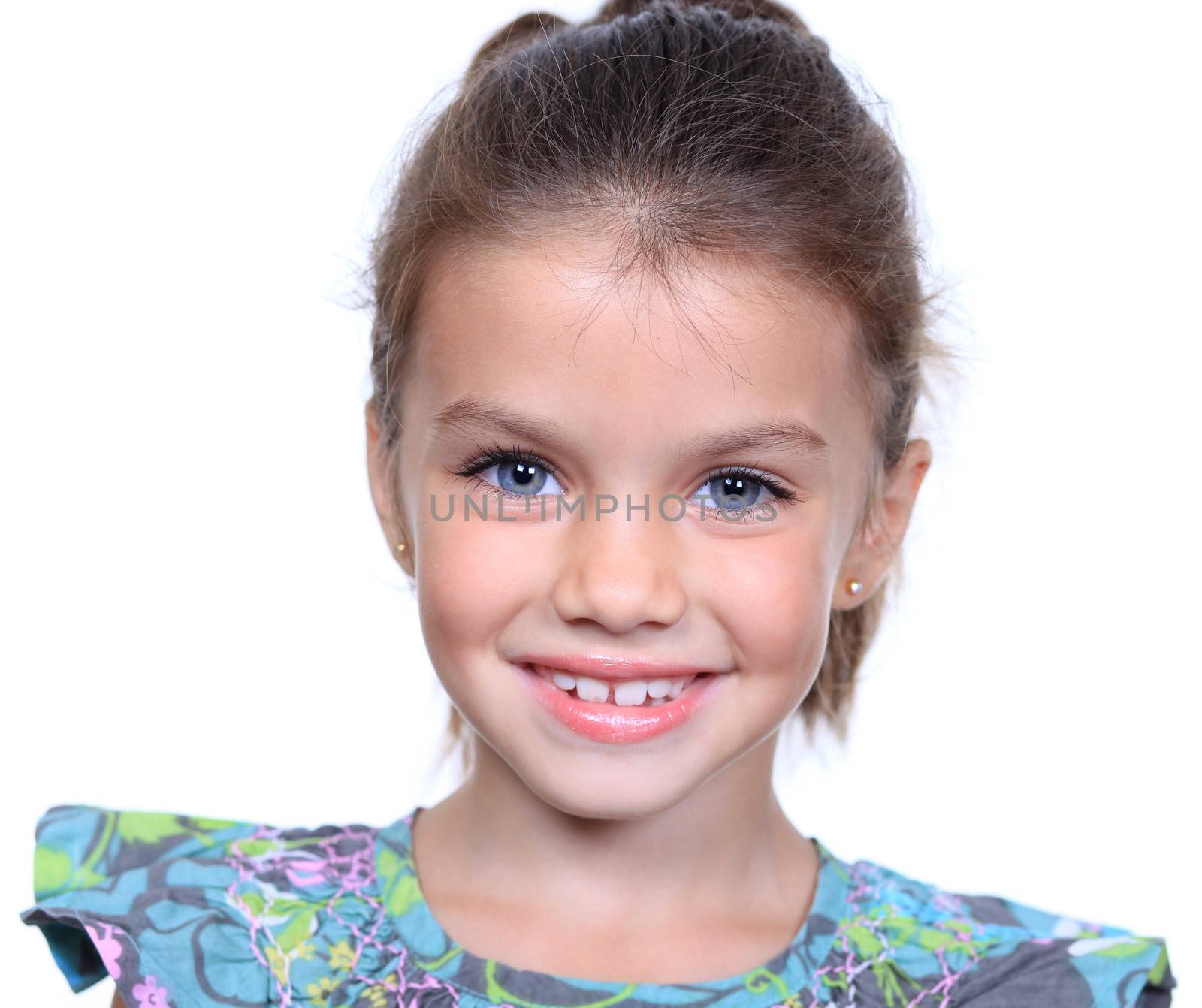 Cute little girl on a white background