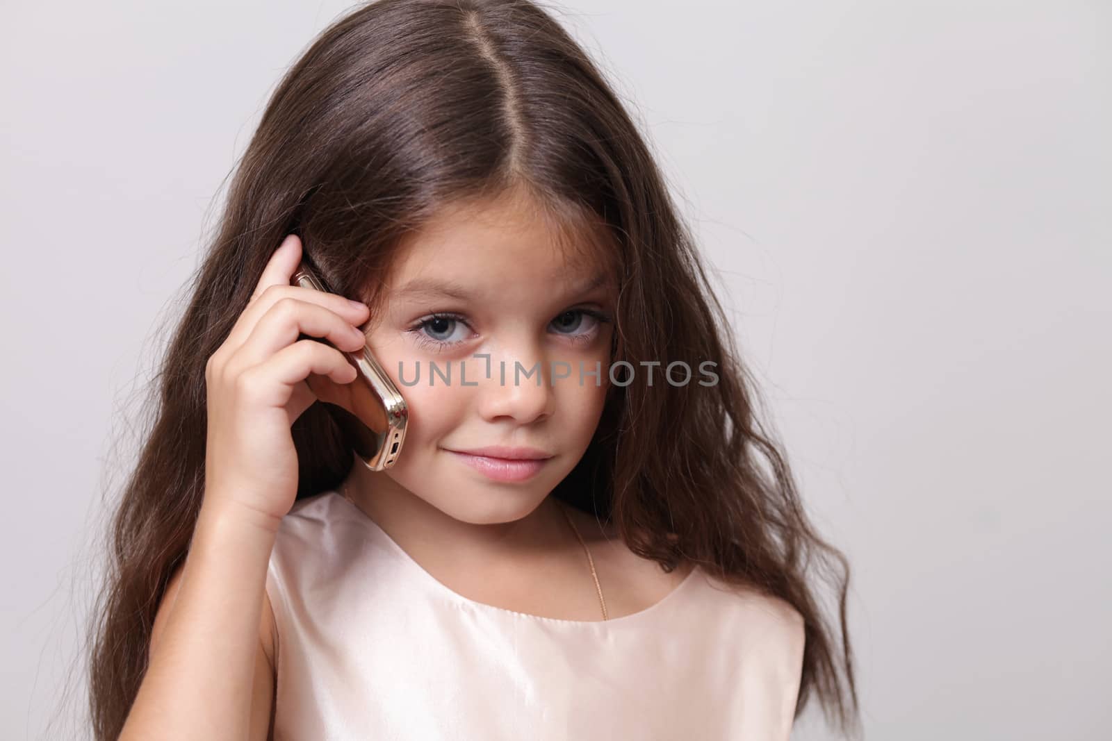 little girl calling by phone by andersonrise