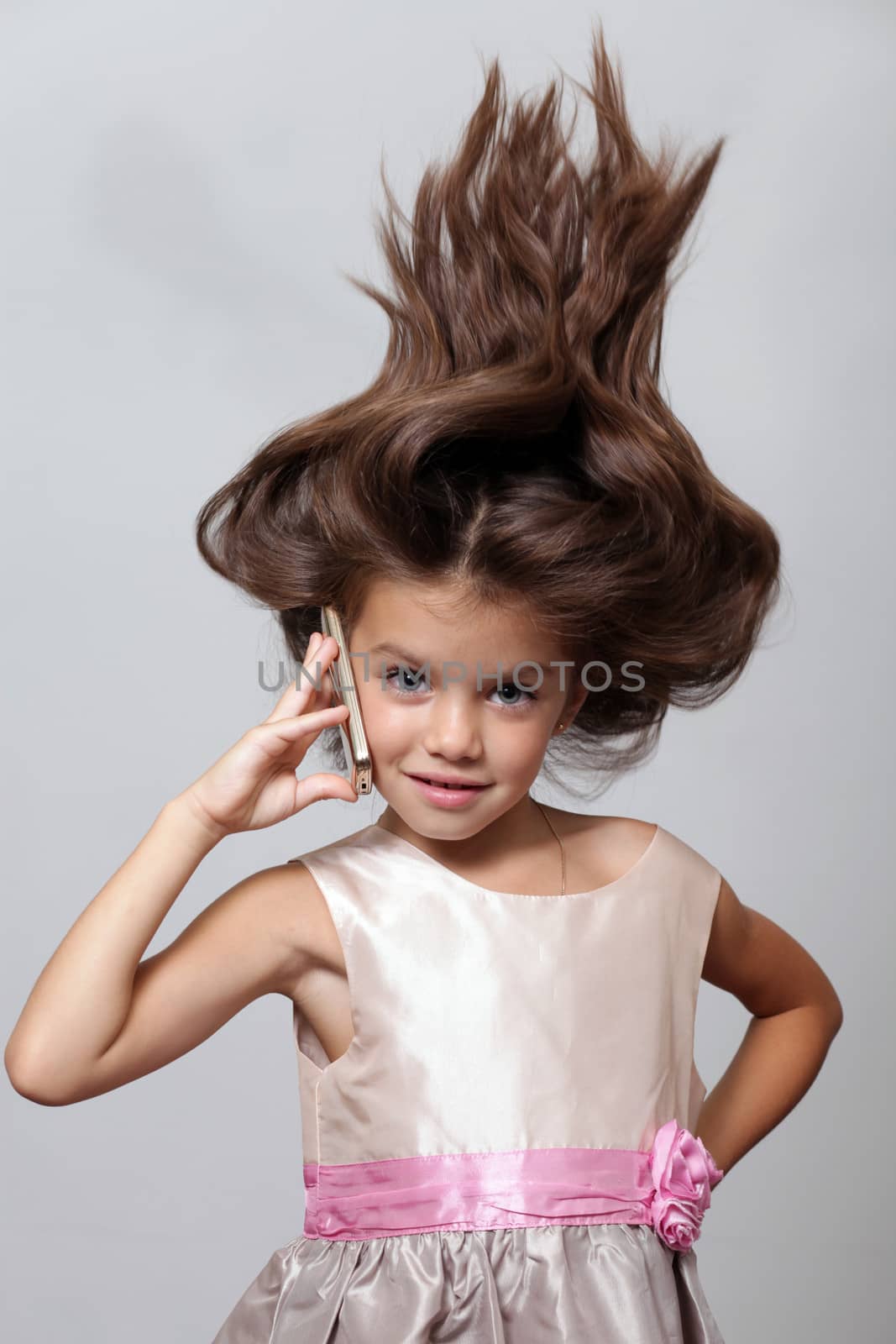 little girl calling by phone