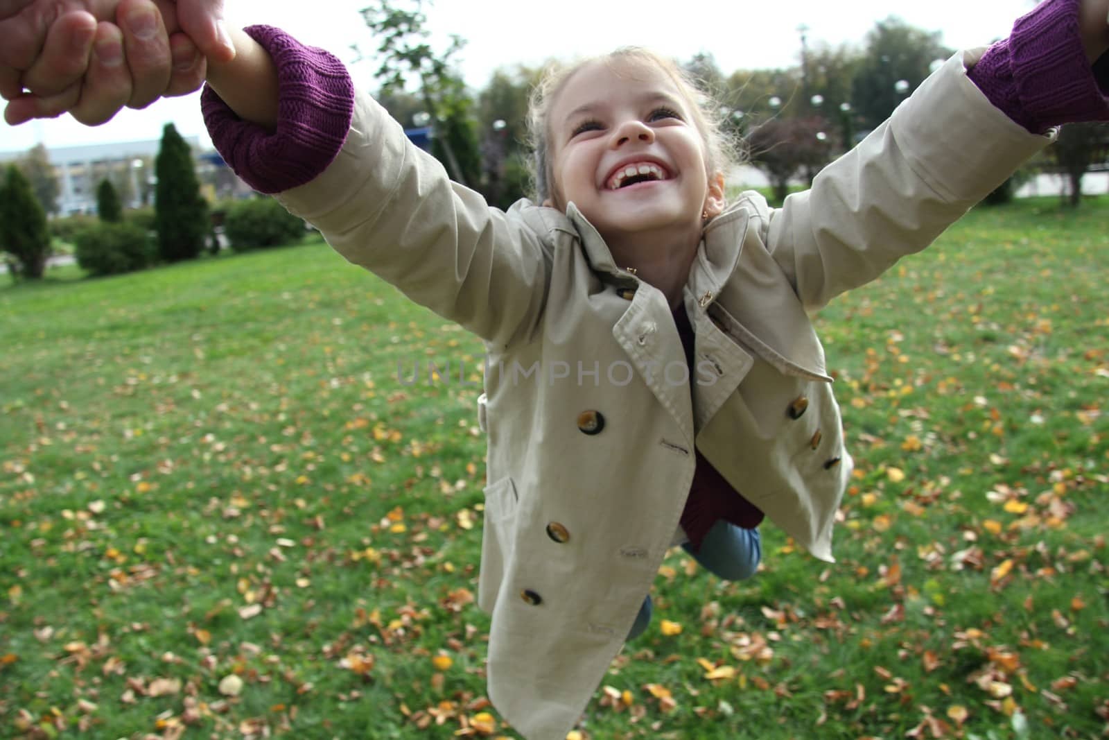 little girl in the autumn park by andersonrise