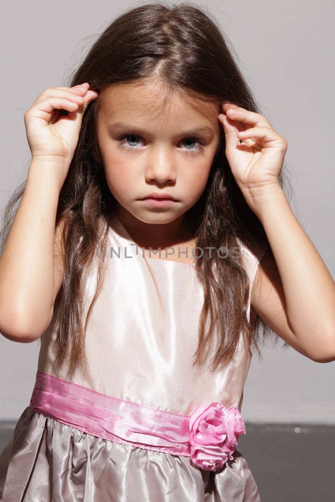 portrait of a little girl in the studio