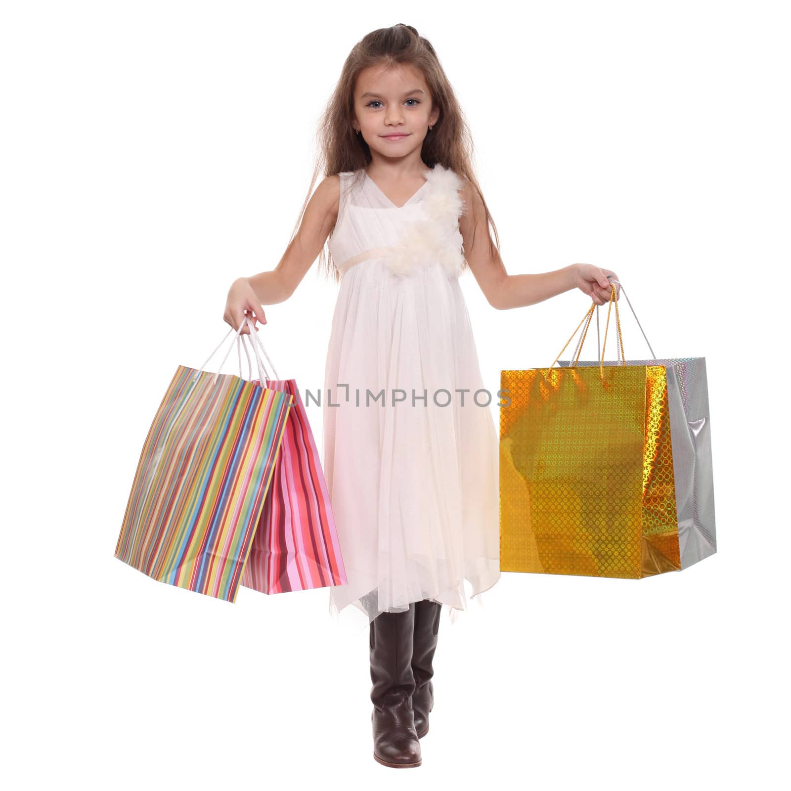 Beautiful little girl with shopping bags by andersonrise
