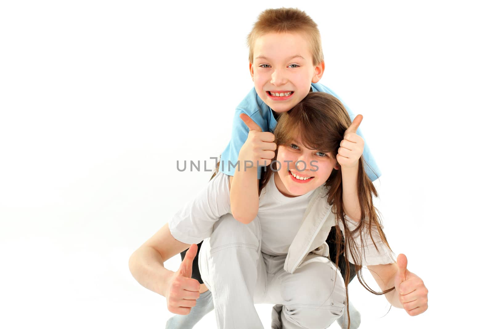 happy little brother and sister on the white background