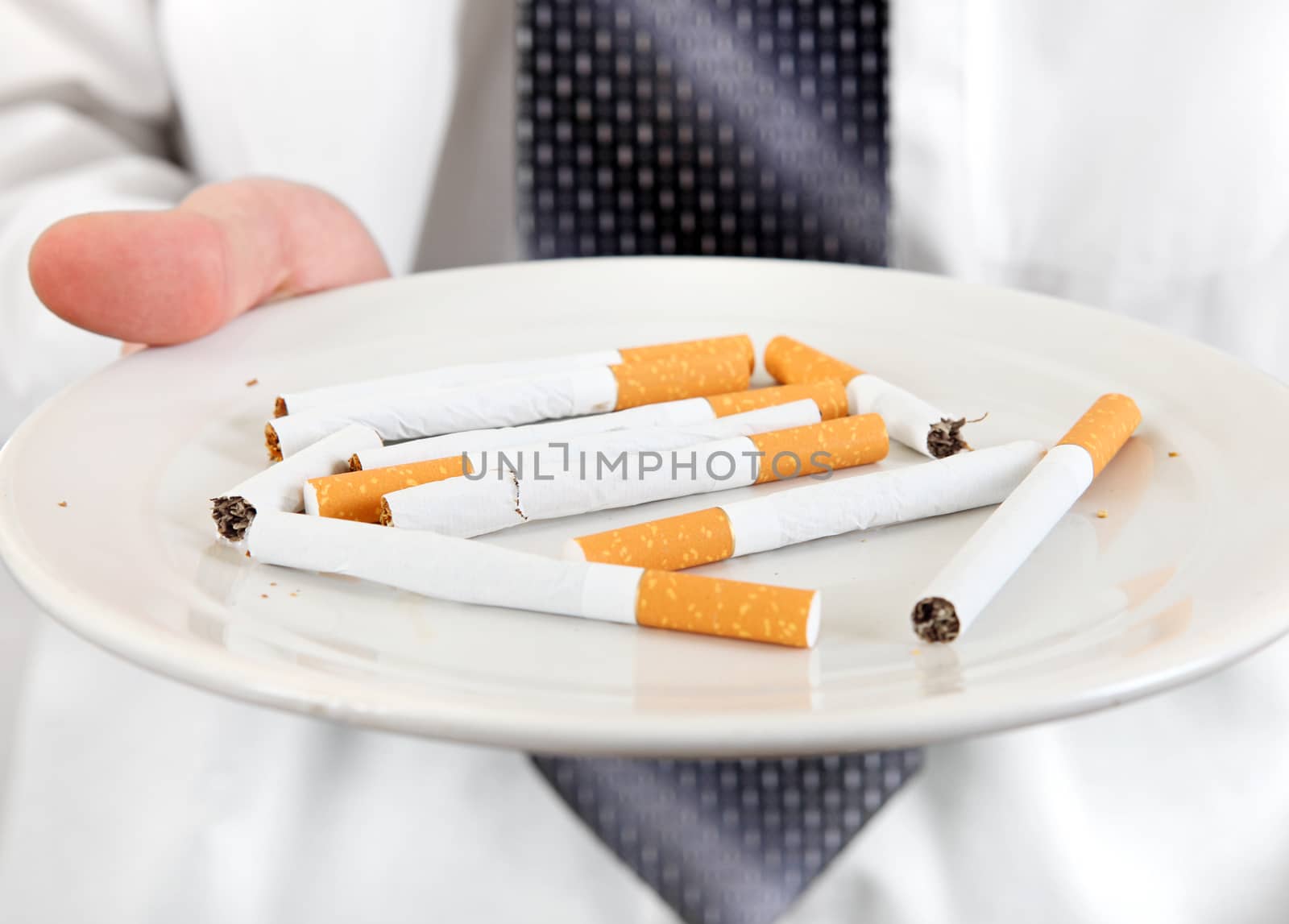 Plate With Cigarettes by sabphoto