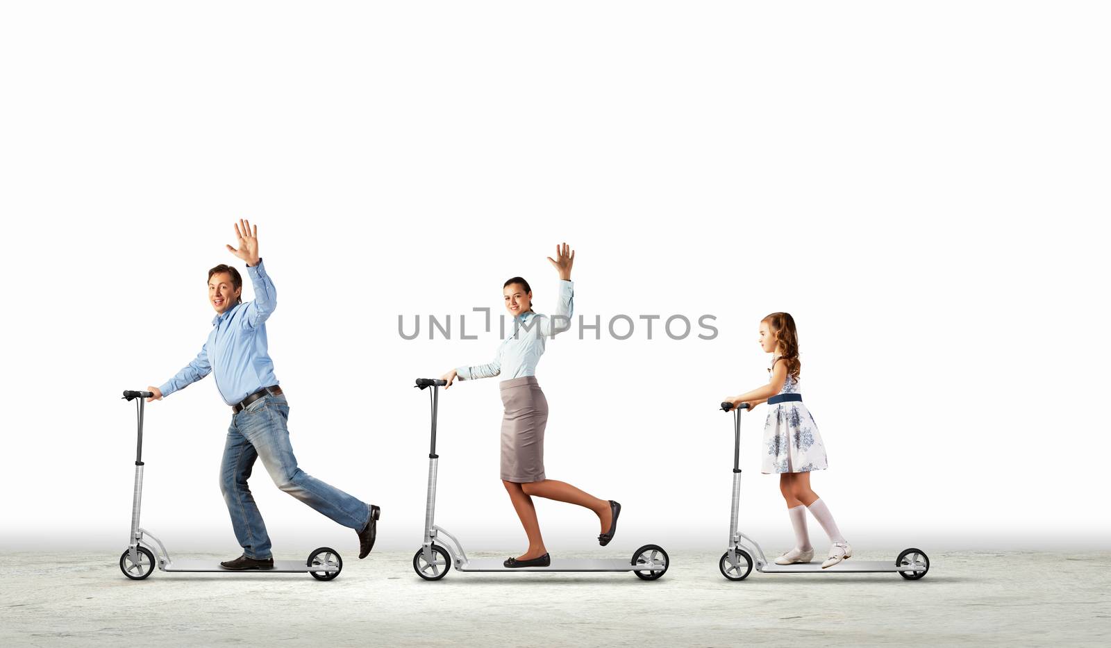 Happy family riding on scooter by sergey_nivens