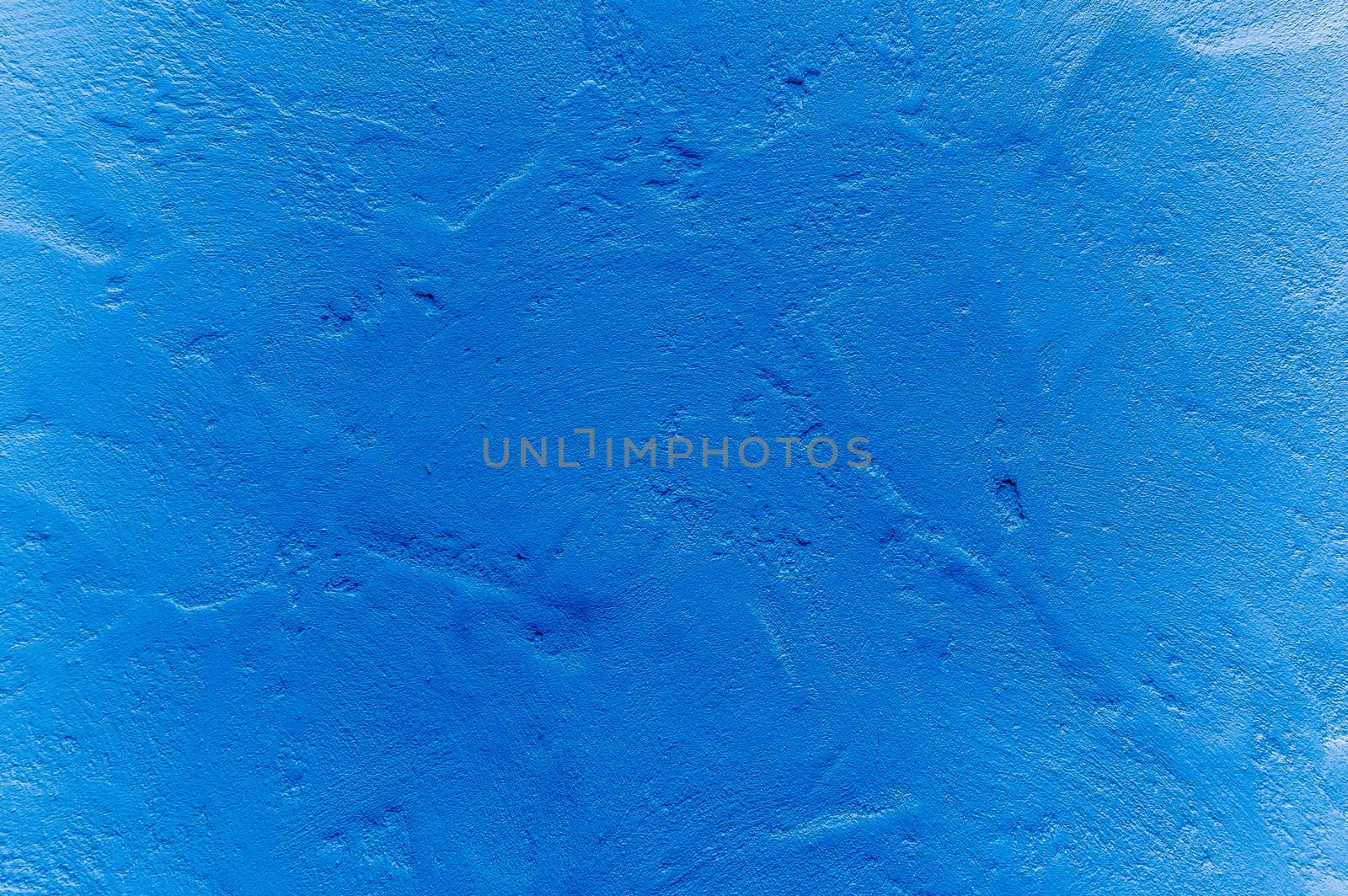 Blue plastered wall background or texture.
